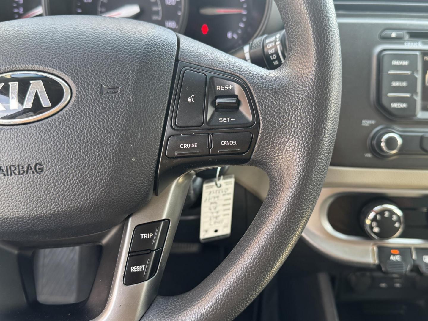 2013 White Kia Rio (KNADM4A34D6) with an 4-Cyl, 1.6 Liter engine, Automatic, 6-Spd transmission, located at 8008 Warden Rd, Sherwood, AR, 72120, (501) 801-6100, 34.830078, -92.186684 - Photo#15