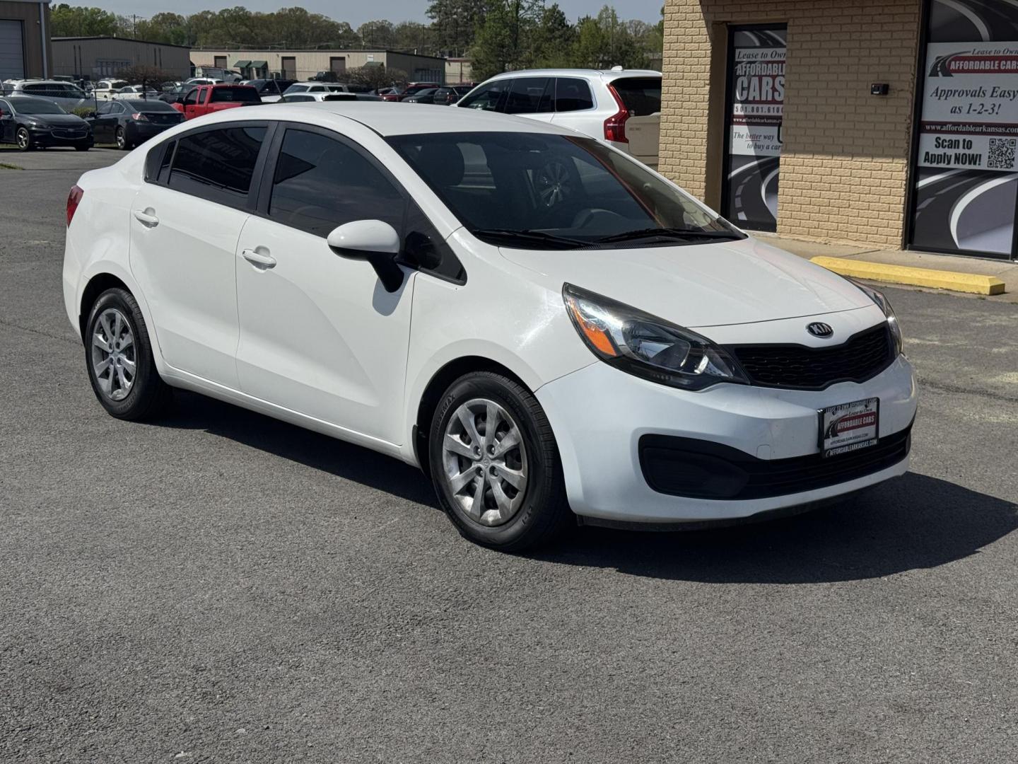 2013 White Kia Rio (KNADM4A34D6) with an 4-Cyl, 1.6 Liter engine, Automatic, 6-Spd transmission, located at 8008 Warden Rd, Sherwood, AR, 72120, (501) 801-6100, 34.830078, -92.186684 - Photo#1