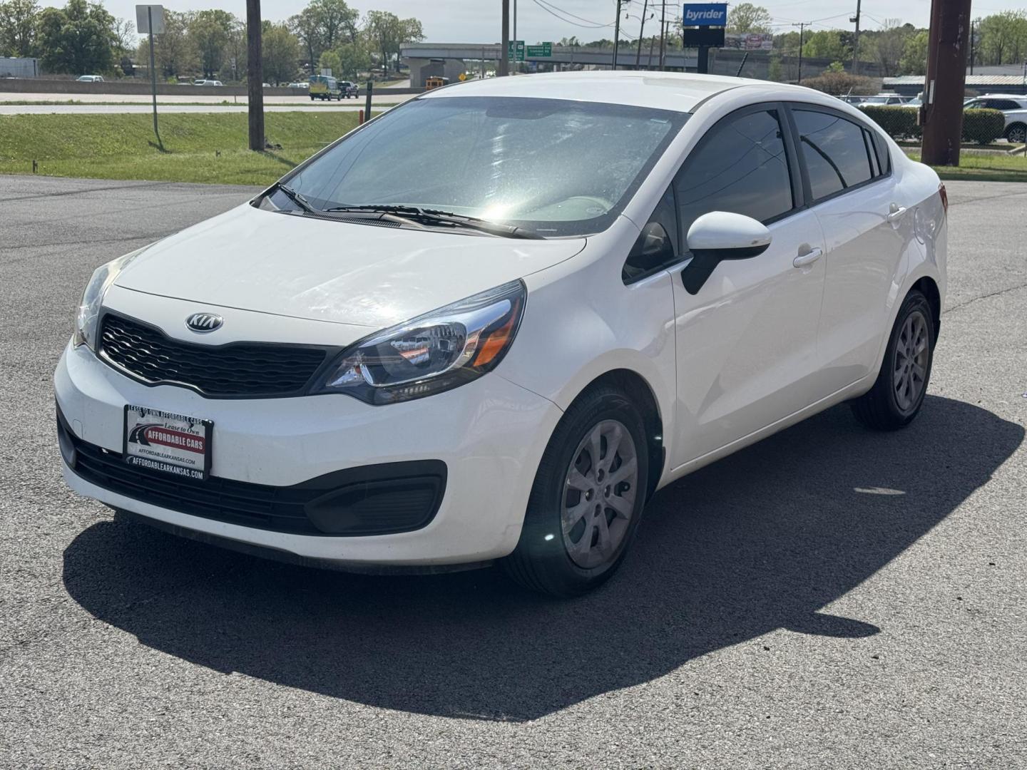 2013 White Kia Rio (KNADM4A34D6) with an 4-Cyl, 1.6 Liter engine, Automatic, 6-Spd transmission, located at 8008 Warden Rd, Sherwood, AR, 72120, (501) 801-6100, 34.830078, -92.186684 - Photo#3