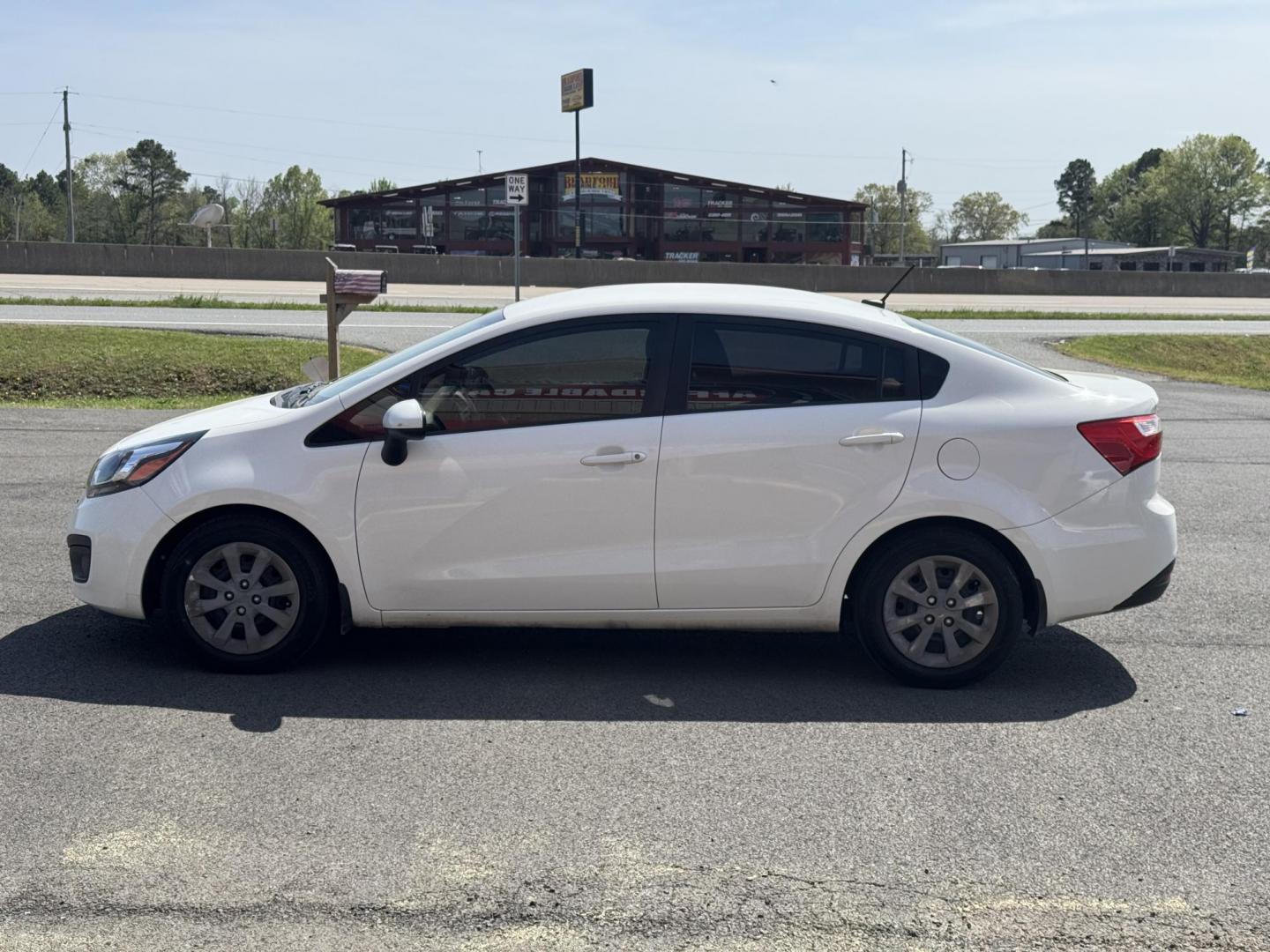 2013 White Kia Rio (KNADM4A34D6) with an 4-Cyl, 1.6 Liter engine, Automatic, 6-Spd transmission, located at 8008 Warden Rd, Sherwood, AR, 72120, (501) 801-6100, 34.830078, -92.186684 - Photo#4