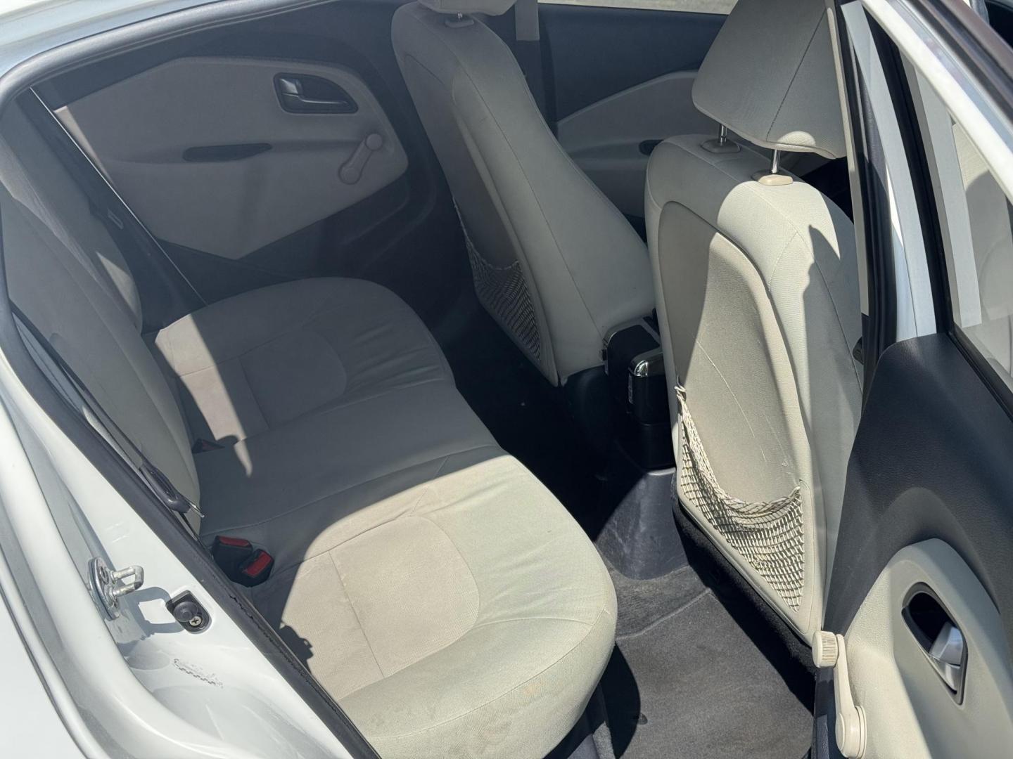 2013 White Kia Rio (KNADM4A34D6) with an 4-Cyl, 1.6 Liter engine, Automatic, 6-Spd transmission, located at 8008 Warden Rd, Sherwood, AR, 72120, (501) 801-6100, 34.830078, -92.186684 - Photo#9