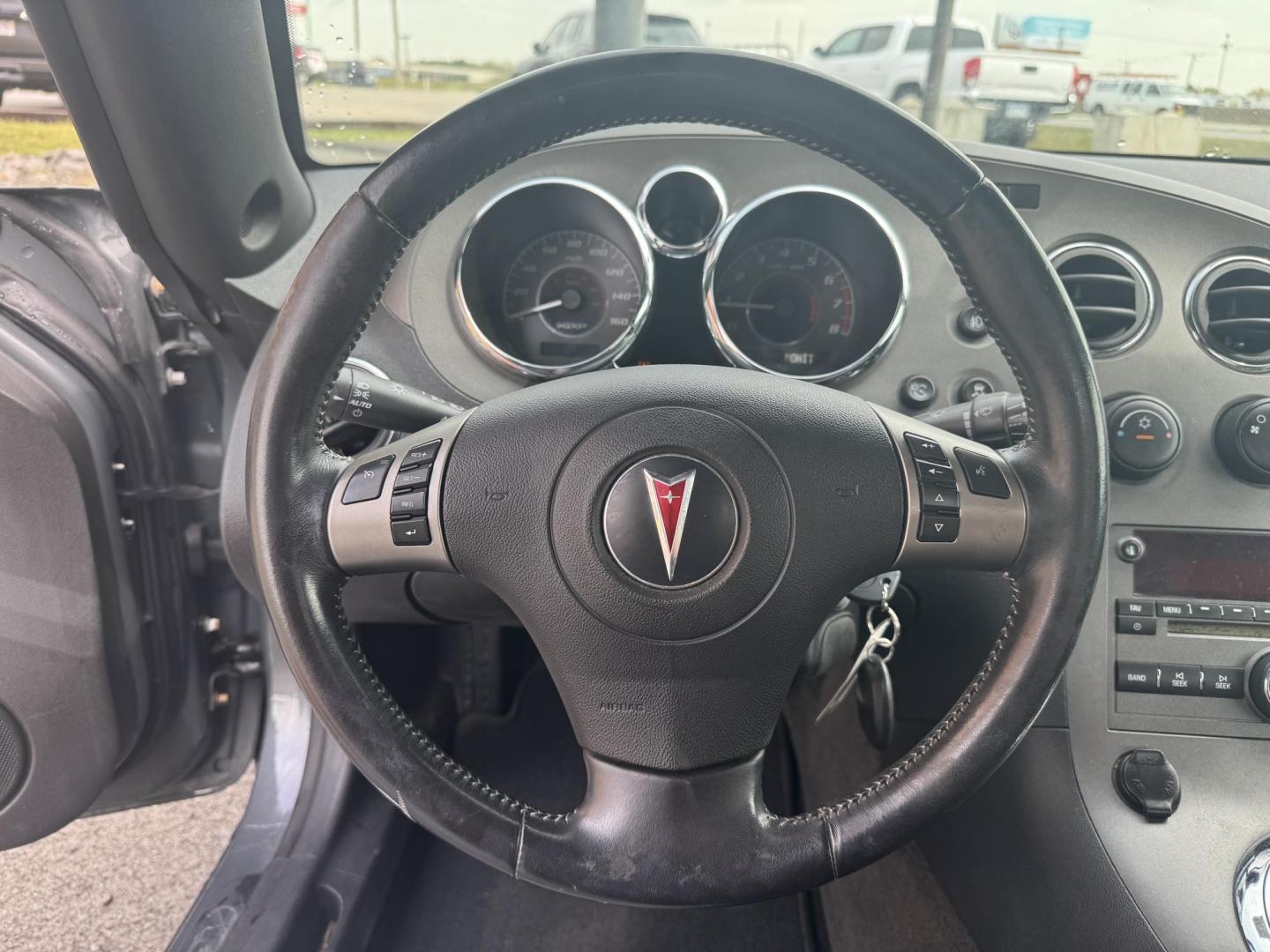 2008 Gray Pontiac Solstice (1G2MF35X78Y) with an 4-Cyl, Turbo, 2.0 Liter engine, Manual, 5-Spd transmission, located at 8008 Warden Rd, Sherwood, AR, 72120, (501) 801-6100, 34.830078, -92.186684 - Photo#9