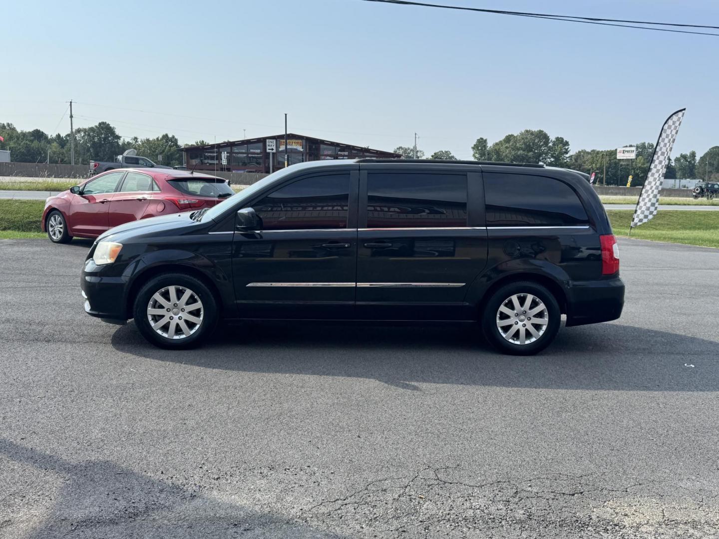 2013 Black Chrysler Town and Country (2C4RC1BG3DR) with an V6, 3.6 Liter engine, Auto, 6-Spd AutoStick transmission, located at 8008 Warden Rd, Sherwood, AR, 72120, (501) 801-6100, 34.830078, -92.186684 - Photo#4
