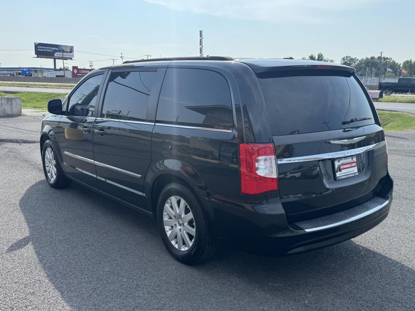 2013 Black Chrysler Town and Country (2C4RC1BG3DR) with an V6, 3.6 Liter engine, Auto, 6-Spd AutoStick transmission, located at 8008 Warden Rd, Sherwood, AR, 72120, (501) 801-6100, 34.830078, -92.186684 - Photo#5