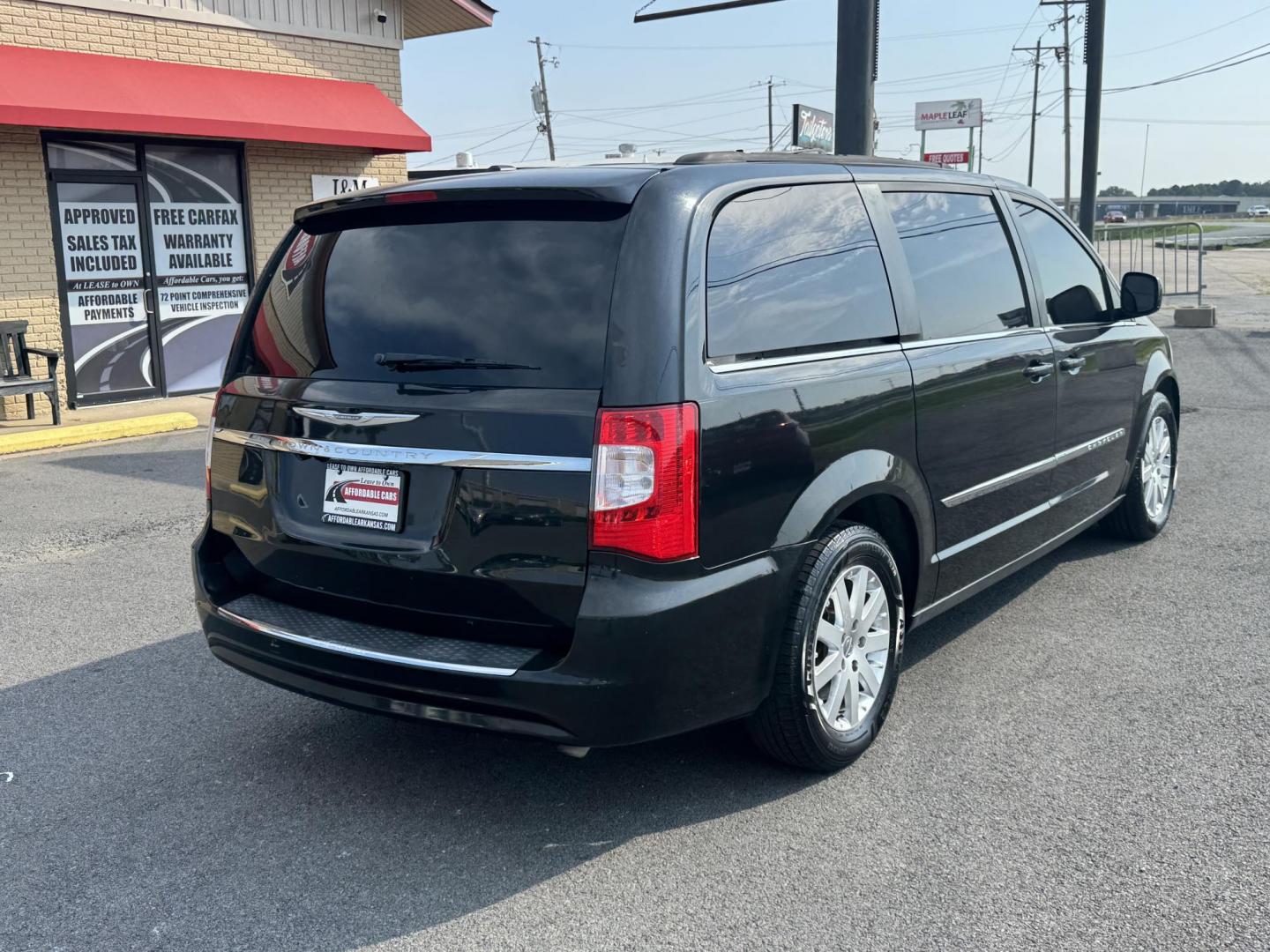 2013 Black Chrysler Town and Country (2C4RC1BG3DR) with an V6, 3.6 Liter engine, Auto, 6-Spd AutoStick transmission, located at 8008 Warden Rd, Sherwood, AR, 72120, (501) 801-6100, 34.830078, -92.186684 - Photo#7