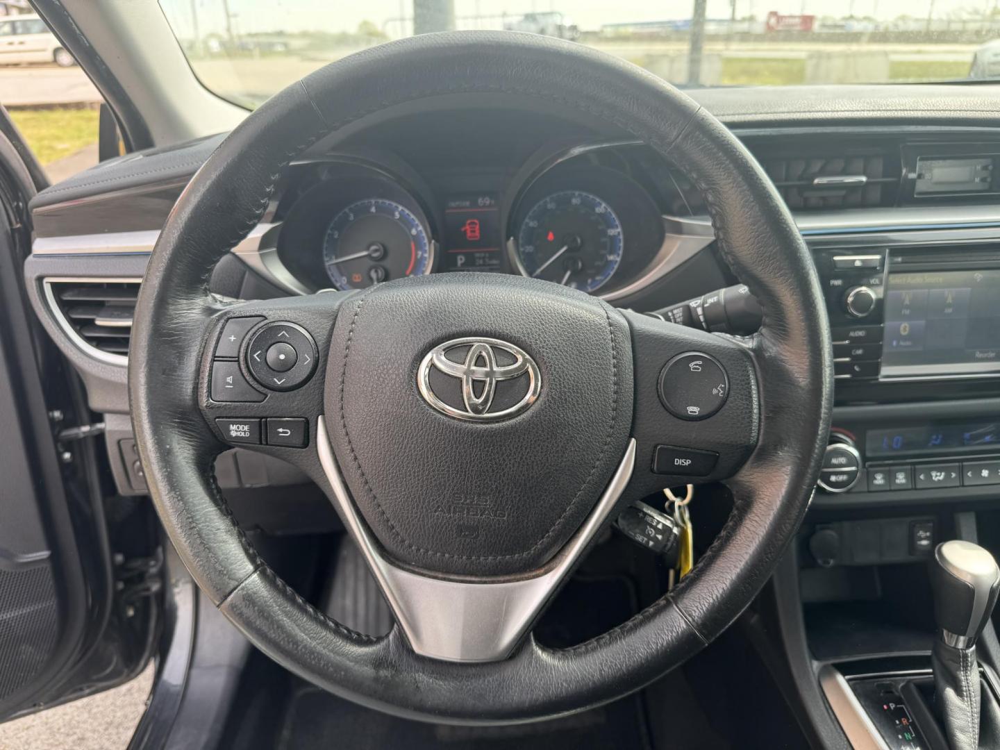 2015 Black Toyota Corolla (2T1BURHEXFC) with an 4-Cyl, 1.8 Liter engine, Auto, CVTi-S Manual transmission, located at 8008 Warden Rd, Sherwood, AR, 72120, (501) 801-6100, 34.830078, -92.186684 - Photo#12