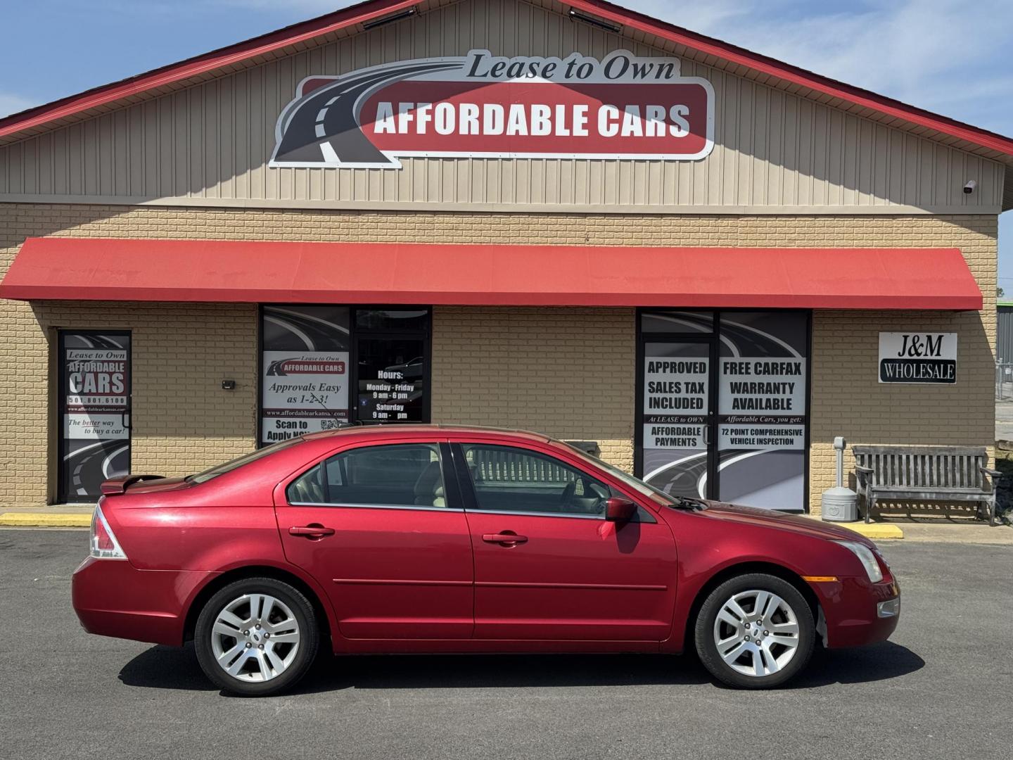 2009 Maroon Ford Fusion (3FAHP08139R) with an V6, 3.0 Liter engine, Automatic, 6-Spd w/Overdrive transmission, located at 8008 Warden Rd, Sherwood, AR, 72120, (501) 801-6100, 34.830078, -92.186684 - Photo#0