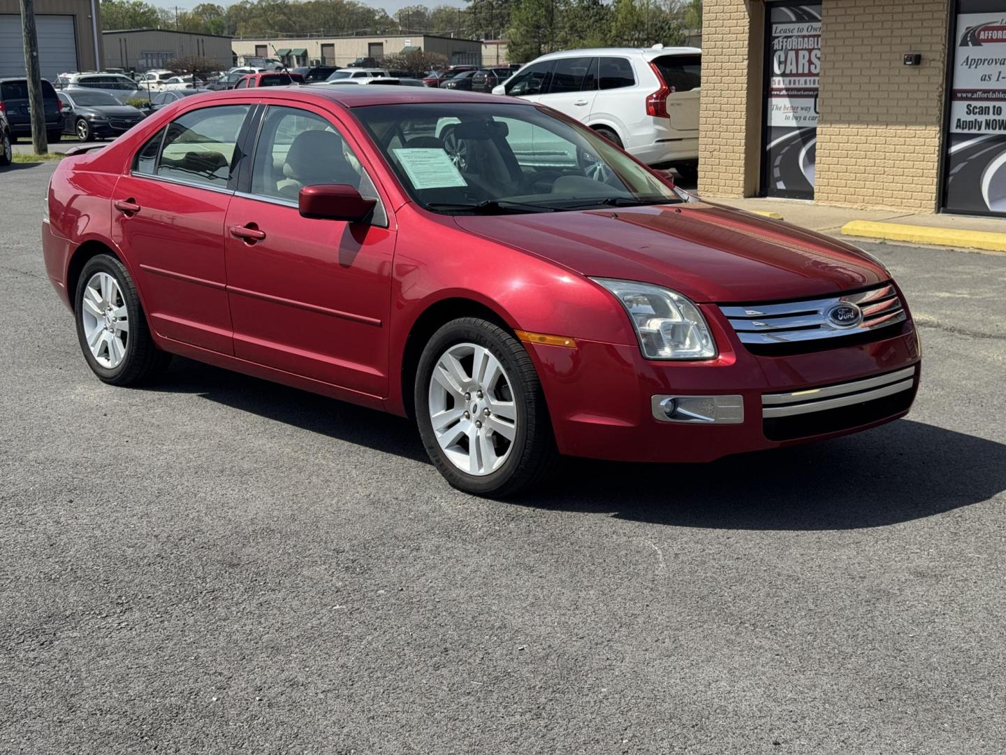 2009 Maroon Ford Fusion (3FAHP08139R) with an V6, 3.0 Liter engine, Automatic, 6-Spd w/Overdrive transmission, located at 8008 Warden Rd, Sherwood, AR, 72120, (501) 801-6100, 34.830078, -92.186684 - Photo#1