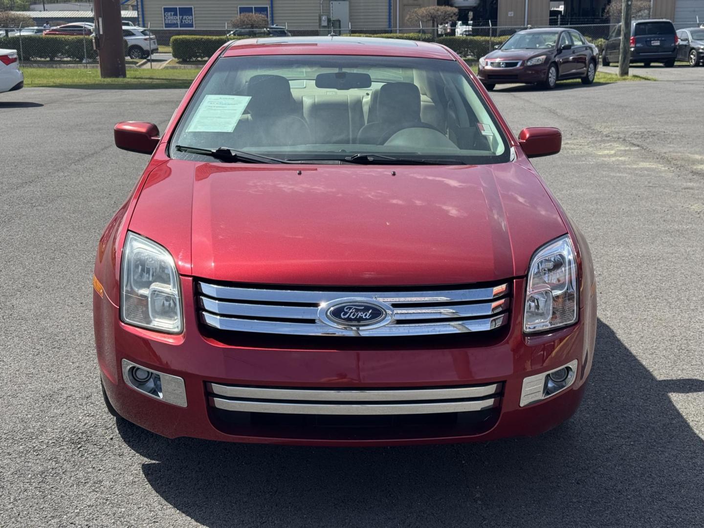 2009 Maroon Ford Fusion (3FAHP08139R) with an V6, 3.0 Liter engine, Automatic, 6-Spd w/Overdrive transmission, located at 8008 Warden Rd, Sherwood, AR, 72120, (501) 801-6100, 34.830078, -92.186684 - Photo#2