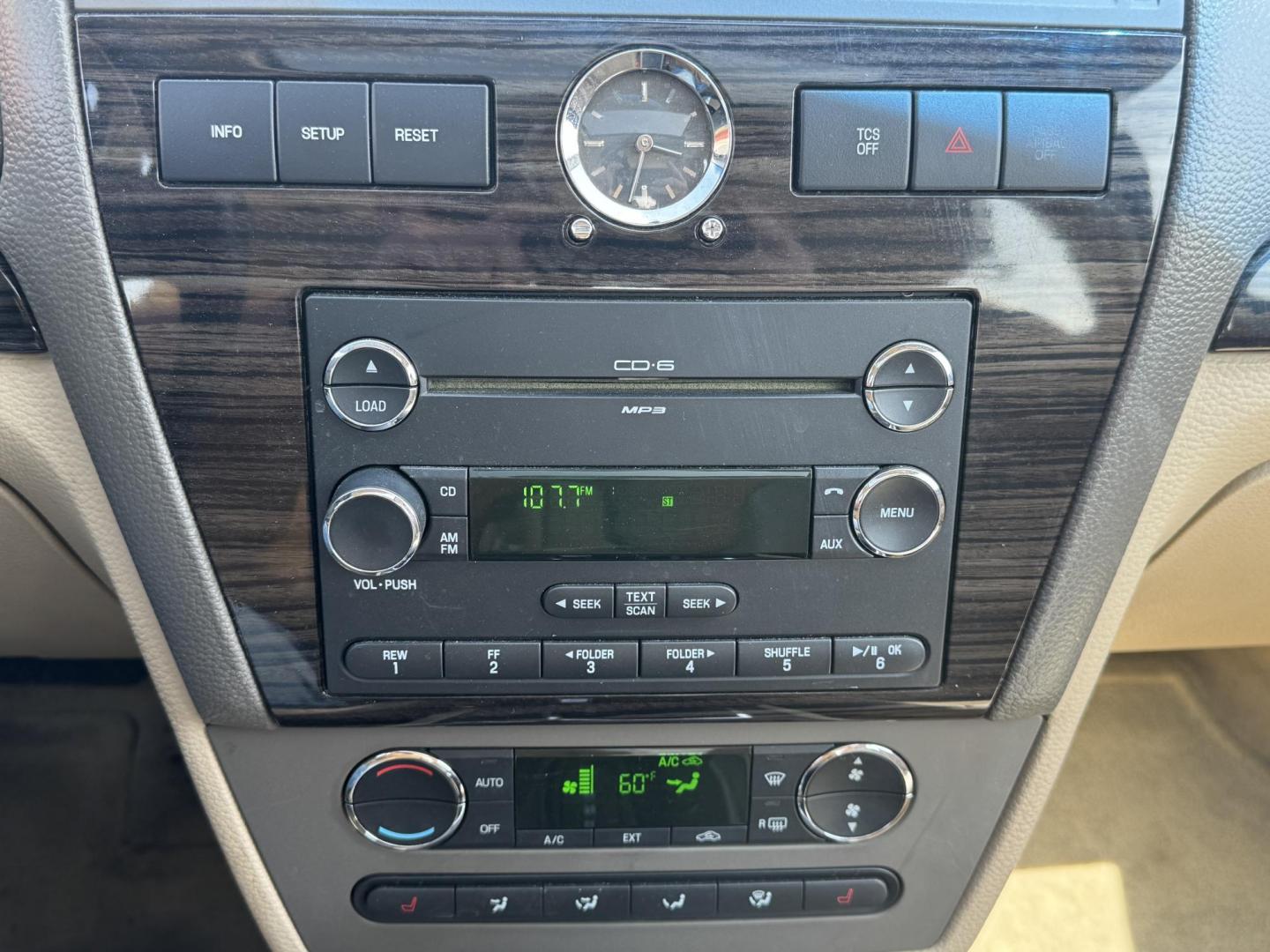 2009 Maroon Ford Fusion (3FAHP08139R) with an V6, 3.0 Liter engine, Automatic, 6-Spd w/Overdrive transmission, located at 8008 Warden Rd, Sherwood, AR, 72120, (501) 801-6100, 34.830078, -92.186684 - Photo#19