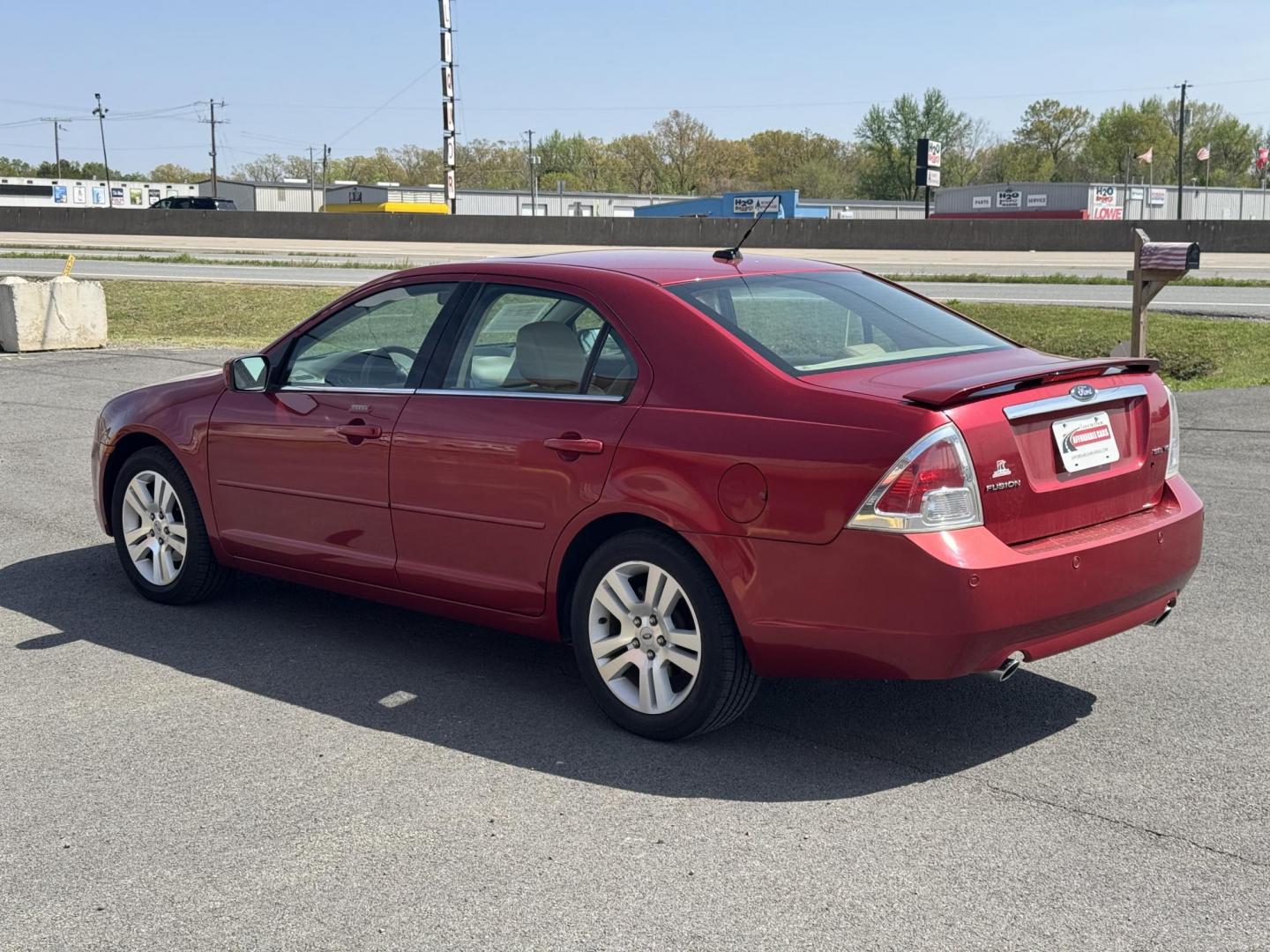 2009 Maroon Ford Fusion (3FAHP08139R) with an V6, 3.0 Liter engine, Automatic, 6-Spd w/Overdrive transmission, located at 8008 Warden Rd, Sherwood, AR, 72120, (501) 801-6100, 34.830078, -92.186684 - Photo#5