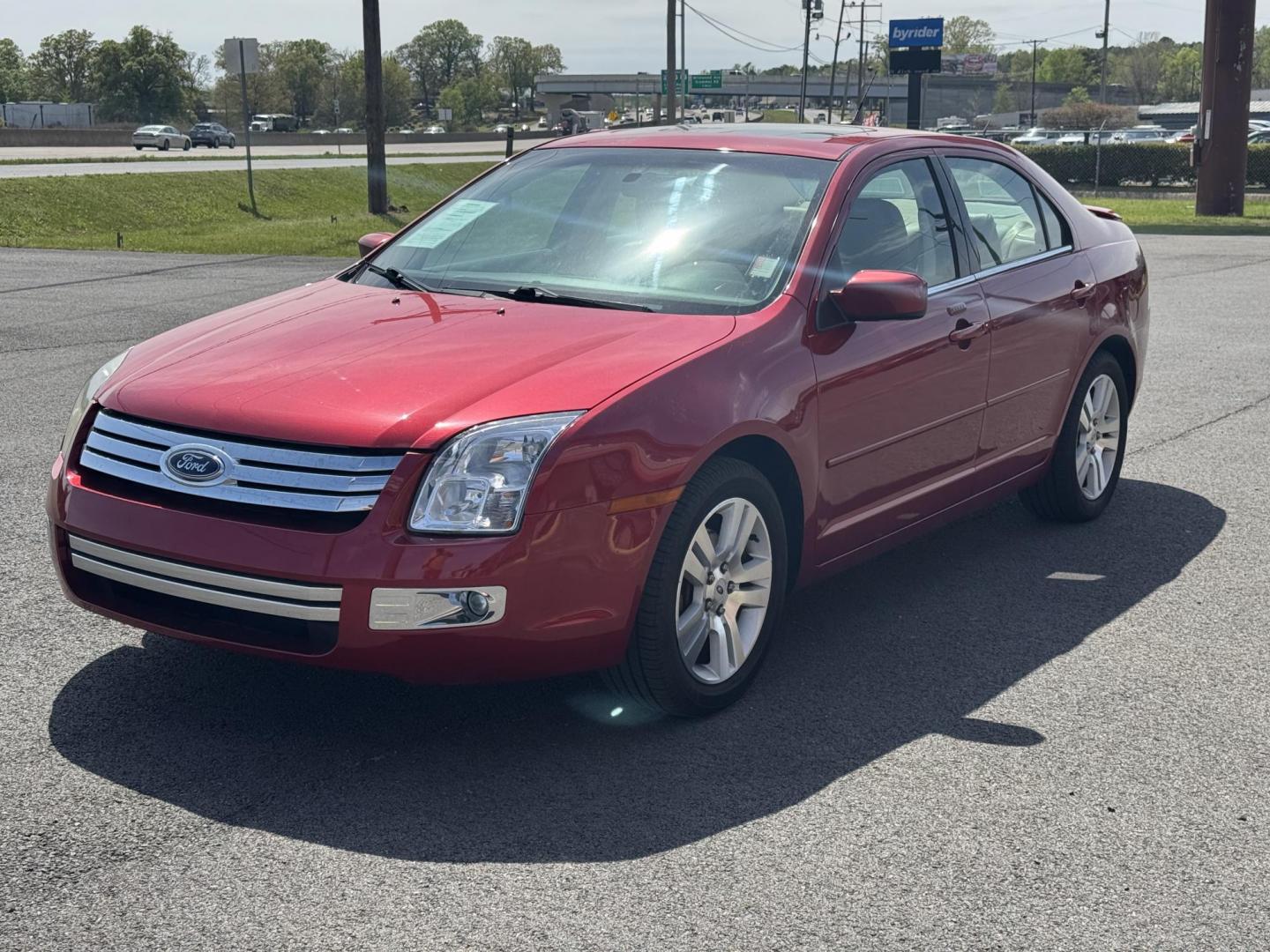 2009 Maroon Ford Fusion (3FAHP08139R) with an V6, 3.0 Liter engine, Automatic, 6-Spd w/Overdrive transmission, located at 8008 Warden Rd, Sherwood, AR, 72120, (501) 801-6100, 34.830078, -92.186684 - Photo#3