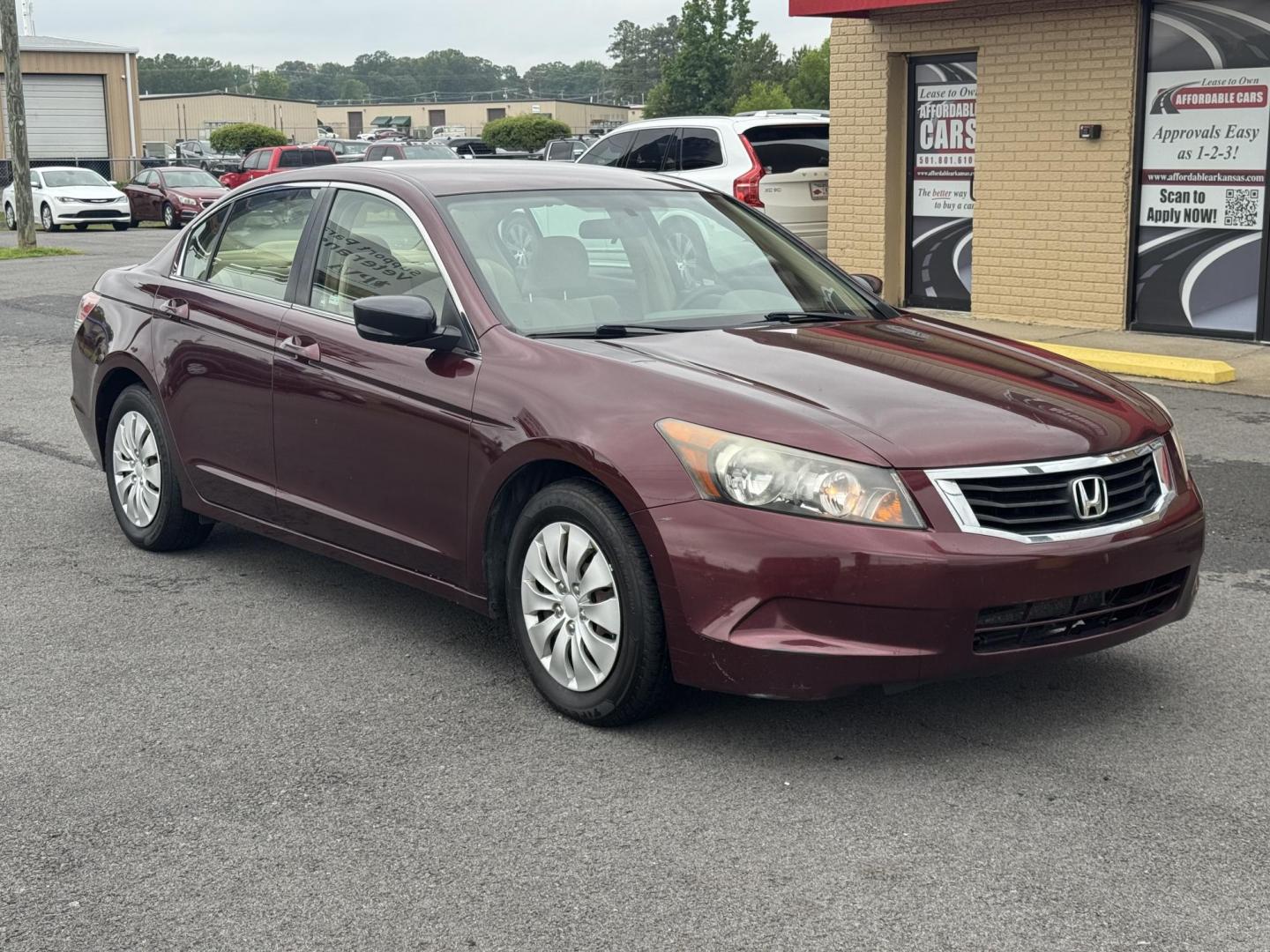 2008 Maroon Honda Accord (JHMCP26348C) with an 4-Cyl, i-VTEC, 2.4L engine, Auto, 5-Spd Overdrive transmission, located at 8008 Warden Rd, Sherwood, AR, 72120, (501) 801-6100, 34.830078, -92.186684 - Photo#1