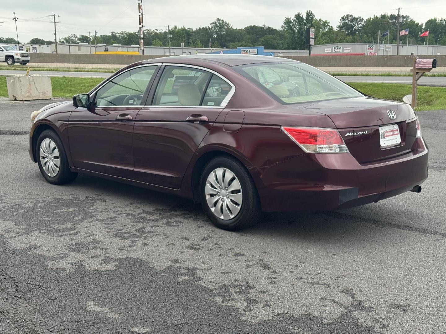 2008 Maroon Honda Accord (JHMCP26348C) with an 4-Cyl, i-VTEC, 2.4L engine, Auto, 5-Spd Overdrive transmission, located at 8008 Warden Rd, Sherwood, AR, 72120, (501) 801-6100, 34.830078, -92.186684 - Photo#5