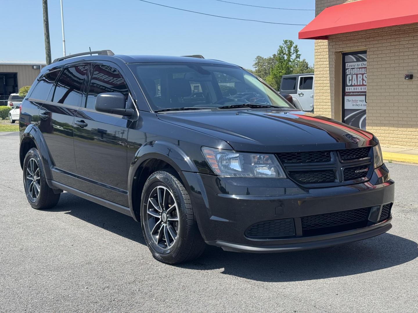2018 Black Dodge Journey (3C4PDCAB0JT) with an 4-Cyl, 2.4 Liter engine, Automatic, 4-Spd w/AutoStick transmission, located at 8008 Warden Rd, Sherwood, AR, 72120, (501) 801-6100, 34.830078, -92.186684 - Photo#2