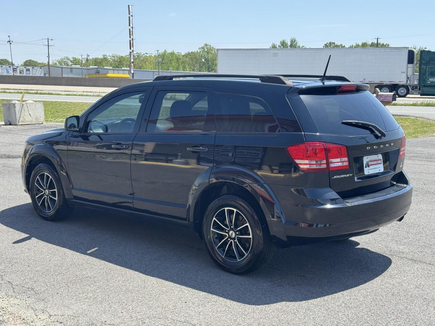 2018 Black Dodge Journey (3C4PDCAB0JT) with an 4-Cyl, 2.4 Liter engine, Automatic, 4-Spd w/AutoStick transmission, located at 8008 Warden Rd, Sherwood, AR, 72120, (501) 801-6100, 34.830078, -92.186684 - Photo#3
