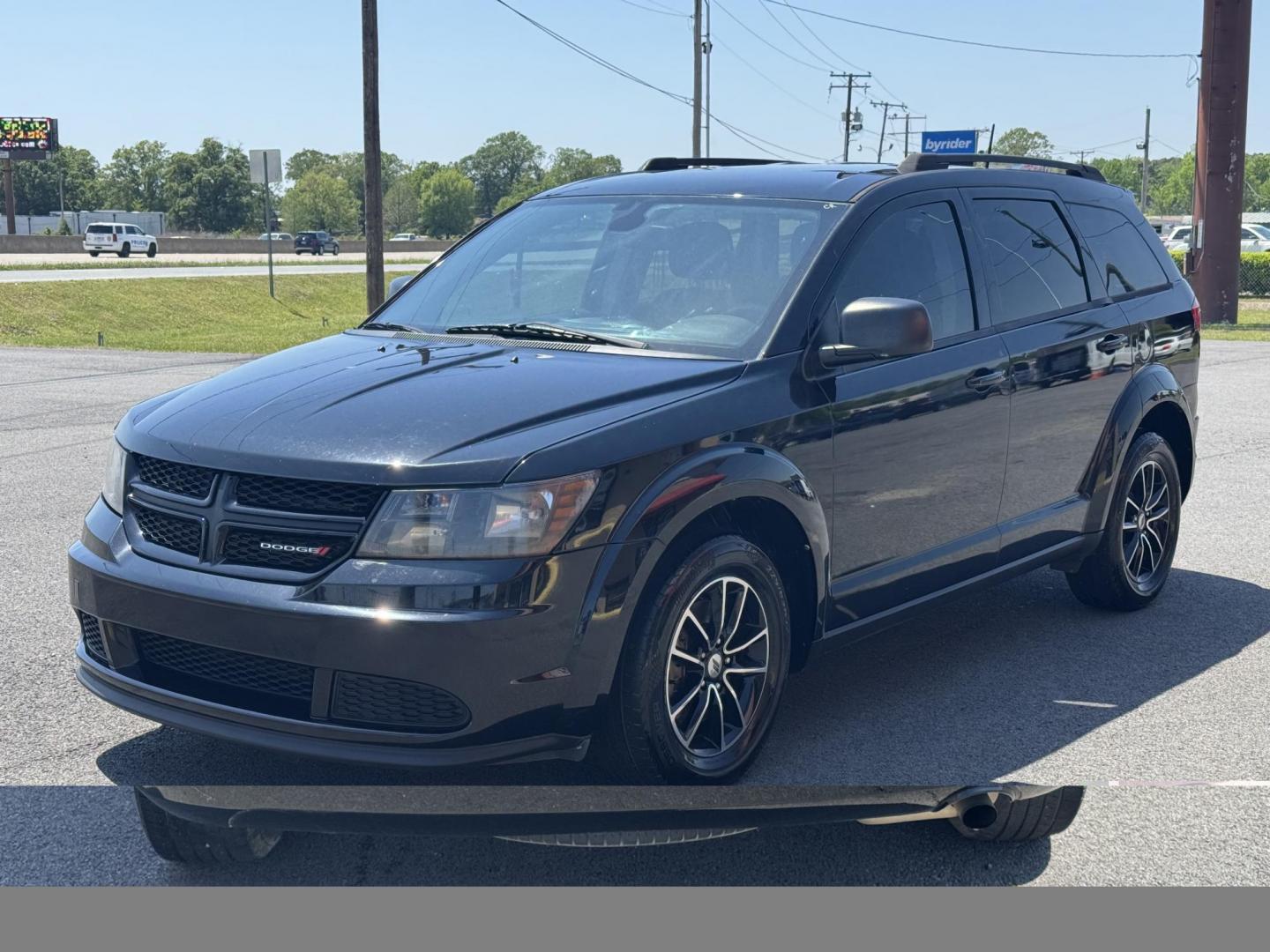 2018 Black Dodge Journey (3C4PDCAB0JT) with an 4-Cyl, 2.4 Liter engine, Automatic, 4-Spd w/AutoStick transmission, located at 8008 Warden Rd, Sherwood, AR, 72120, (501) 801-6100, 34.830078, -92.186684 - Photo#4