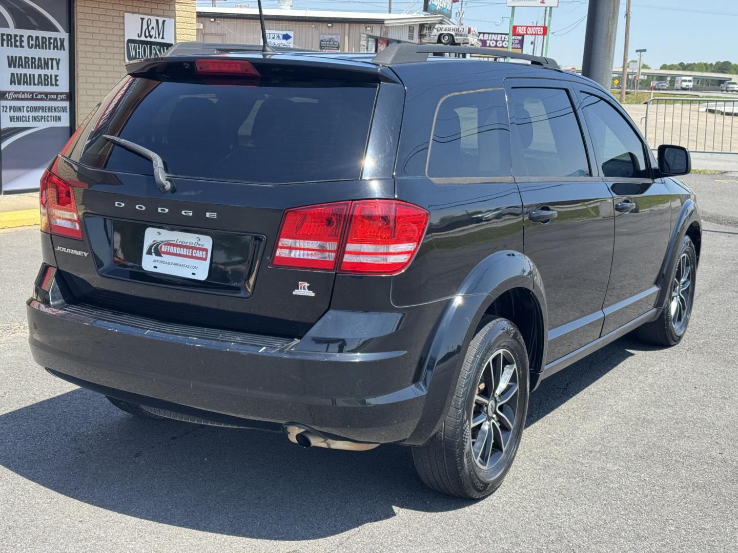 2018 Black Dodge Journey (3C4PDCAB0JT) with an 4-Cyl, 2.4 Liter engine, Automatic, 4-Spd w/AutoStick transmission, located at 8008 Warden Rd, Sherwood, AR, 72120, (501) 801-6100, 34.830078, -92.186684 - Photo#6