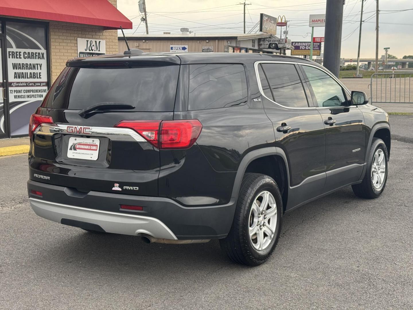 2017 Black GMC Acadia (1GKKNRLA5HZ) with an 4-Cyl, 2.5 Liter engine, Automatic, 6-Spd transmission, located at 8008 Warden Rd, Sherwood, AR, 72120, (501) 801-6100, 34.830078, -92.186684 - Photo#7