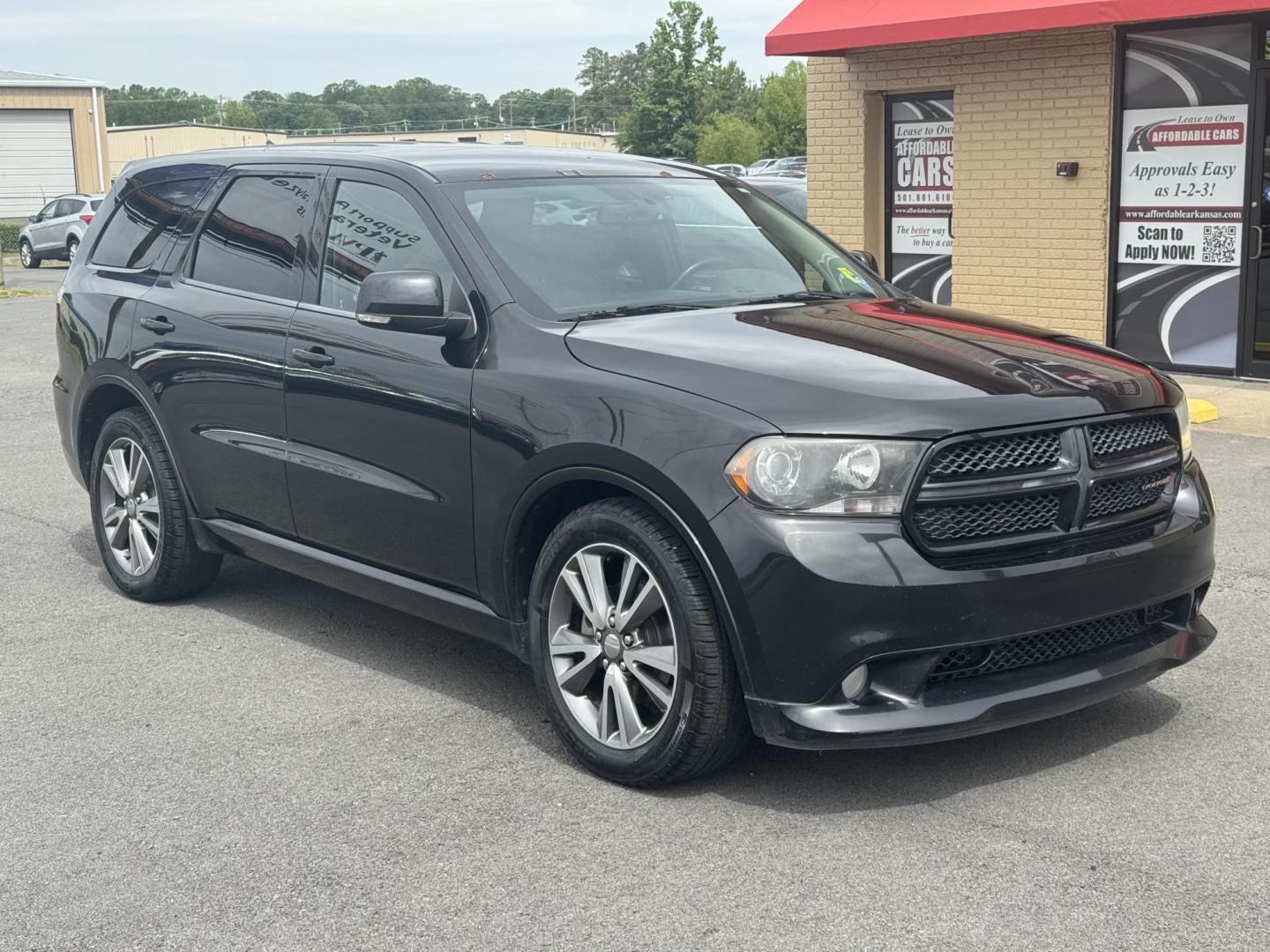 2013 Black Dodge Durango (1C4SDHCT5DC) with an V8, HEMI, 5.7 Liter engine, Auto, 6-Spd w/OD transmission, located at 8008 Warden Rd, Sherwood, AR, 72120, (501) 801-6100, 34.830078, -92.186684 - Photo#1
