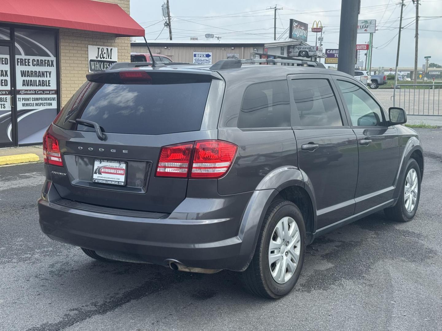 2017 Gray Dodge Journey (3C4PDCAB9HT) with an 4-Cyl, 2.4 Liter engine, Auto, 4-Spd AutoStick transmission, located at 8008 Warden Rd, Sherwood, AR, 72120, (501) 801-6100, 34.830078, -92.186684 - Photo#7