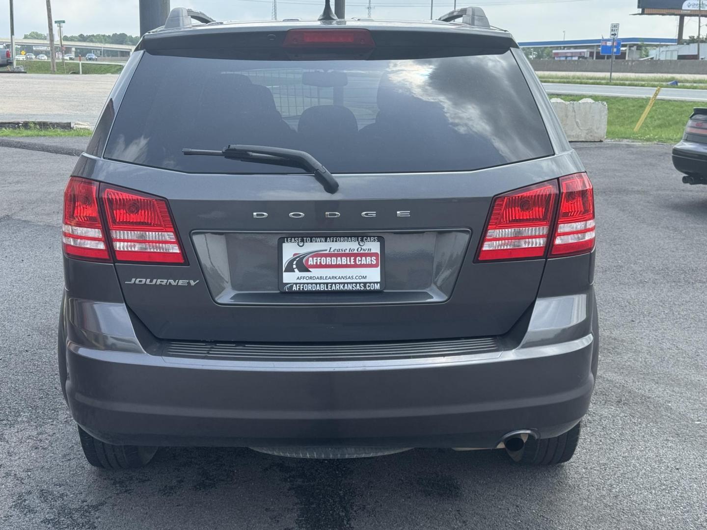 2017 Gray Dodge Journey (3C4PDCAB9HT) with an 4-Cyl, 2.4 Liter engine, Auto, 4-Spd AutoStick transmission, located at 8008 Warden Rd, Sherwood, AR, 72120, (501) 801-6100, 34.830078, -92.186684 - Photo#6
