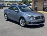 2014 Blue Volkswagen Eos (WVWFW8AH6EV) with an 4-Cyl, Turbo, 2.0 Liter engine, Auto, 6-Spd DSG Tiptronic transmission, located at 8008 Warden Rd, Sherwood, AR, 72120, (501) 801-6100, 34.830078, -92.186684 - Photo#2