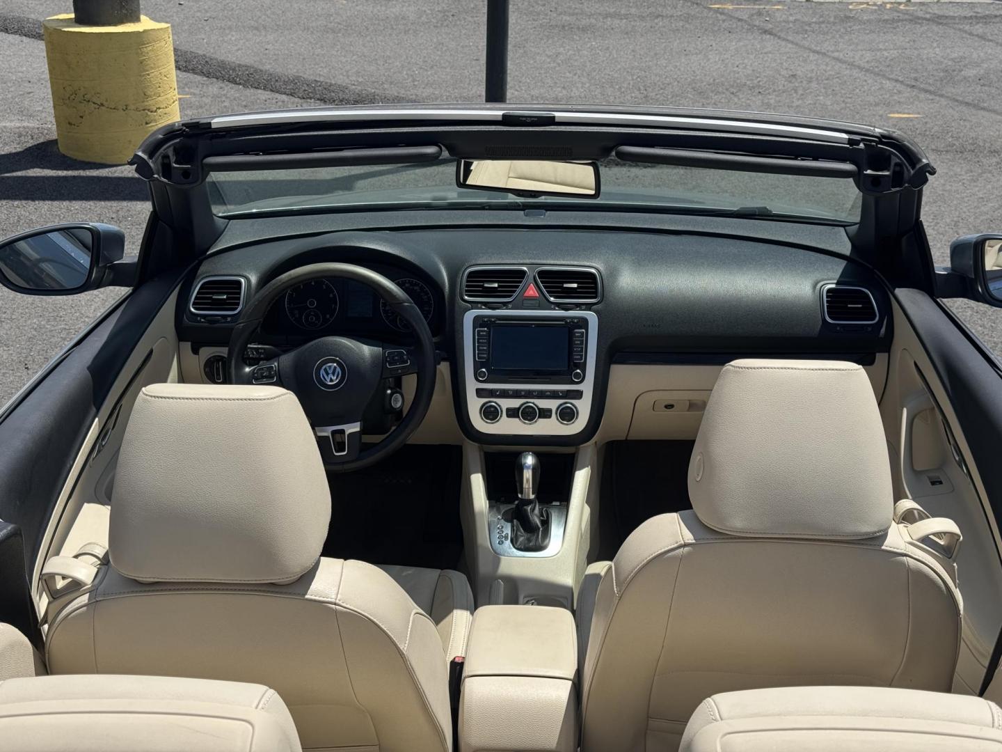 2014 Blue Volkswagen Eos (WVWFW8AH6EV) with an 4-Cyl, Turbo, 2.0 Liter engine, Auto, 6-Spd DSG Tiptronic transmission, located at 8008 Warden Rd, Sherwood, AR, 72120, (501) 801-6100, 34.830078, -92.186684 - Photo#9