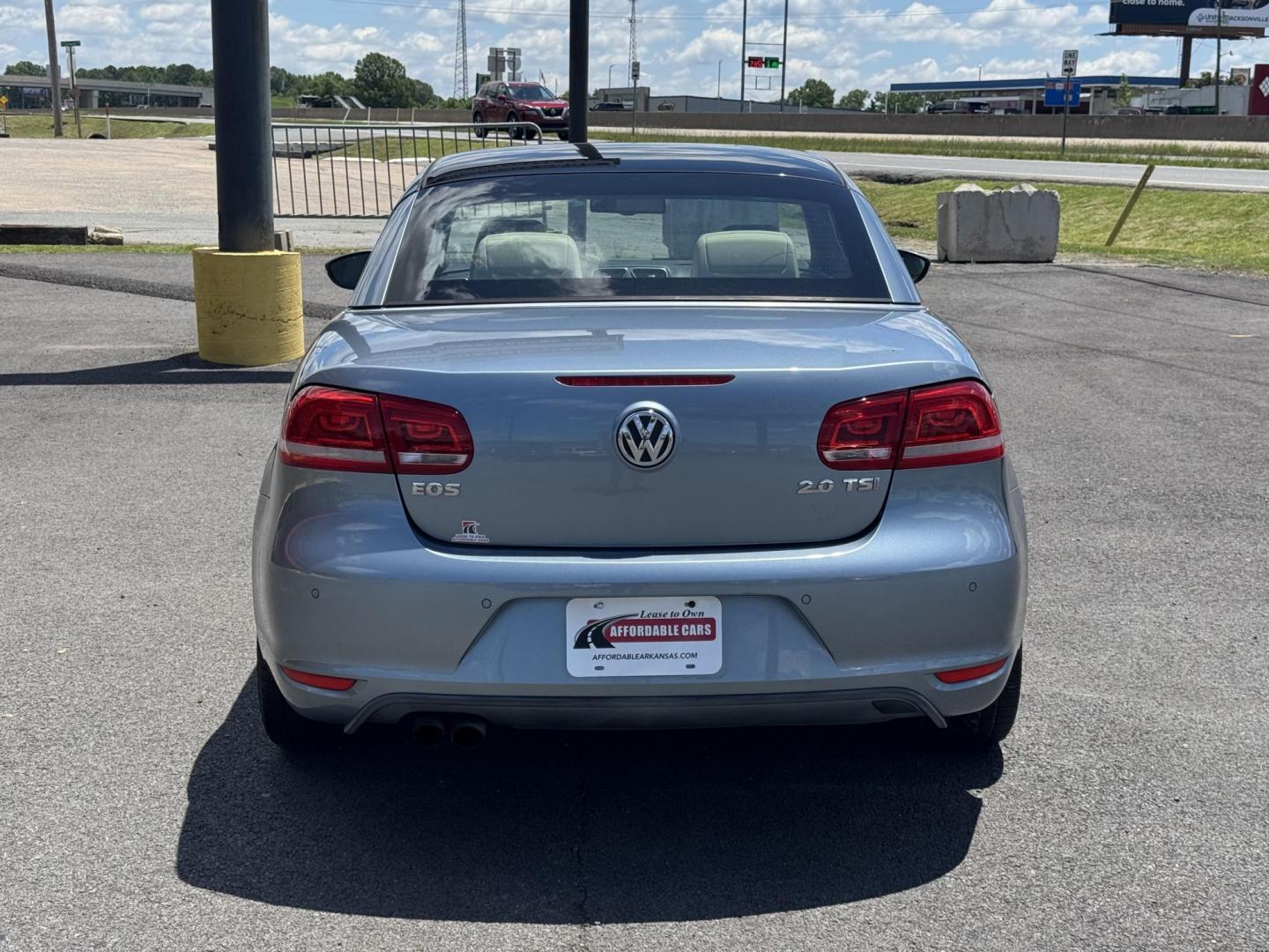2014 Blue Volkswagen Eos (WVWFW8AH6EV) with an 4-Cyl, Turbo, 2.0 Liter engine, Auto, 6-Spd DSG Tiptronic transmission, located at 8008 Warden Rd, Sherwood, AR, 72120, (501) 801-6100, 34.830078, -92.186684 - Photo#7
