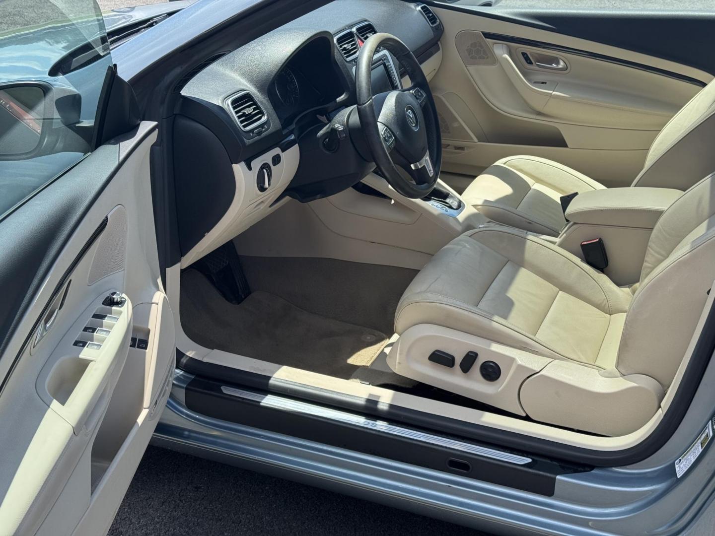 2014 Blue Volkswagen Eos (WVWFW8AH6EV) with an 4-Cyl, Turbo, 2.0 Liter engine, Auto, 6-Spd DSG Tiptronic transmission, located at 8008 Warden Rd, Sherwood, AR, 72120, (501) 801-6100, 34.830078, -92.186684 - Photo#14