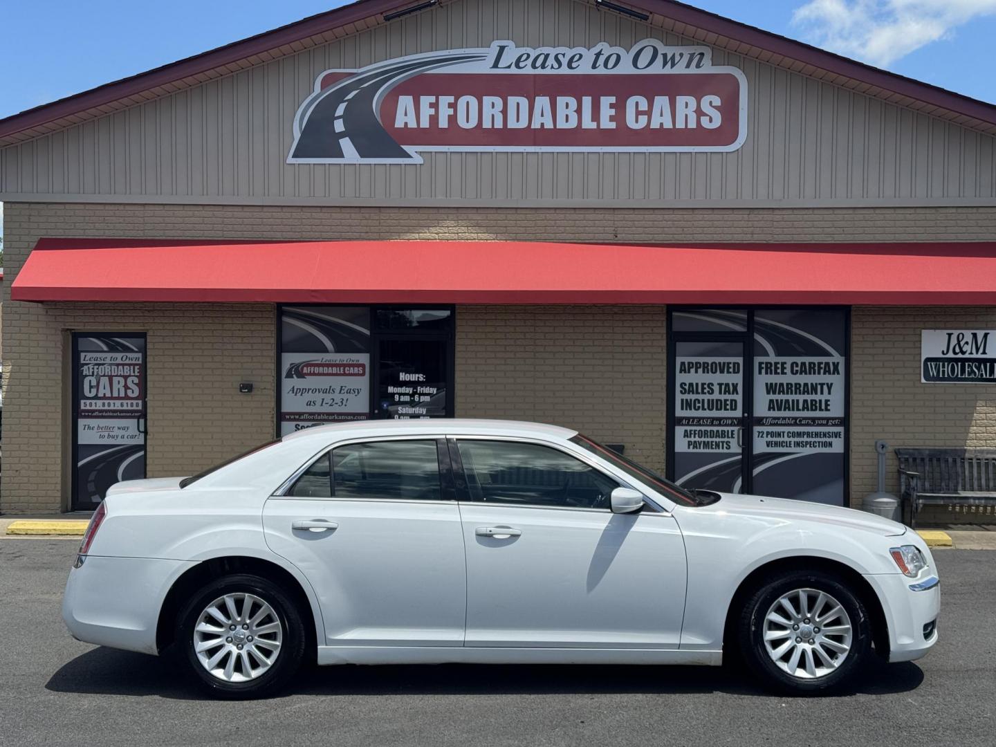 2014 White Chrysler 300 (2C3CCAAG3EH) with an V6, 3.6 Liter engine, Automatic, 8-Spd transmission, located at 8008 Warden Rd, Sherwood, AR, 72120, (501) 801-6100, 34.830078, -92.186684 - Photo#0