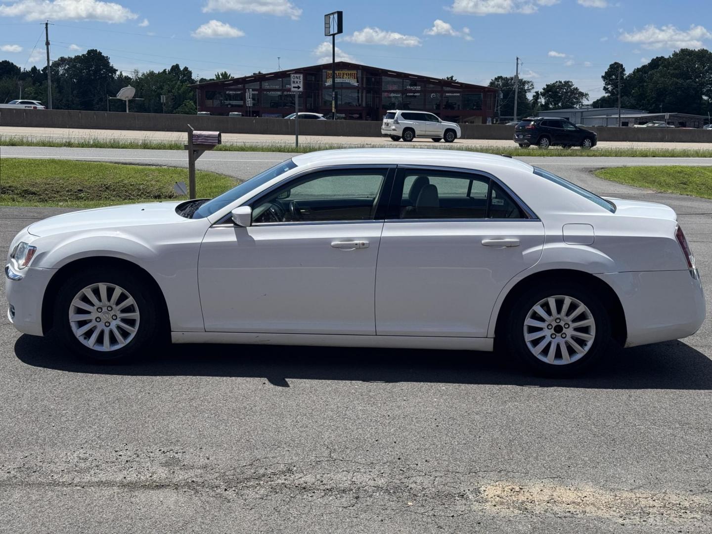 2014 White Chrysler 300 (2C3CCAAG3EH) with an V6, 3.6 Liter engine, Automatic, 8-Spd transmission, located at 8008 Warden Rd, Sherwood, AR, 72120, (501) 801-6100, 34.830078, -92.186684 - Photo#4