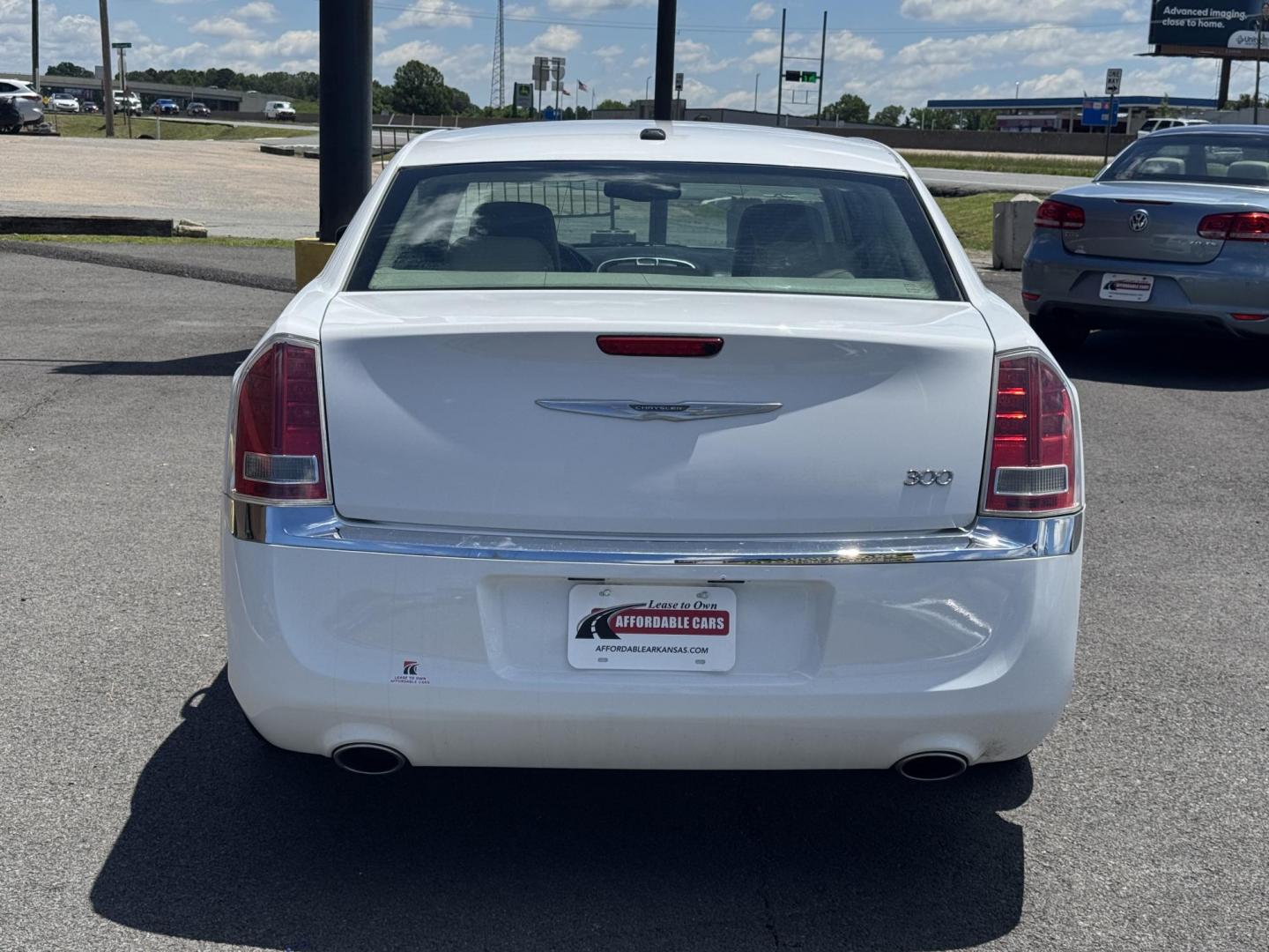2014 White Chrysler 300 (2C3CCAAG3EH) with an V6, 3.6 Liter engine, Automatic, 8-Spd transmission, located at 8008 Warden Rd, Sherwood, AR, 72120, (501) 801-6100, 34.830078, -92.186684 - Photo#6