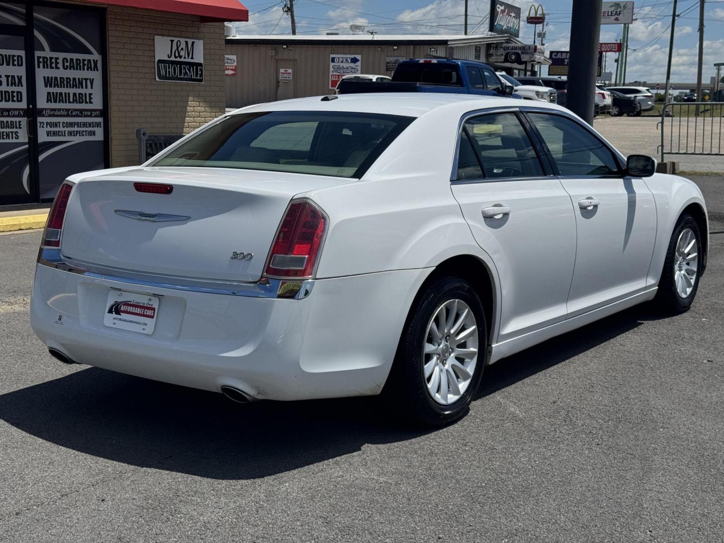 2014 White Chrysler 300 (2C3CCAAG3EH) with an V6, 3.6 Liter engine, Automatic, 8-Spd transmission, located at 8008 Warden Rd, Sherwood, AR, 72120, (501) 801-6100, 34.830078, -92.186684 - Photo#7