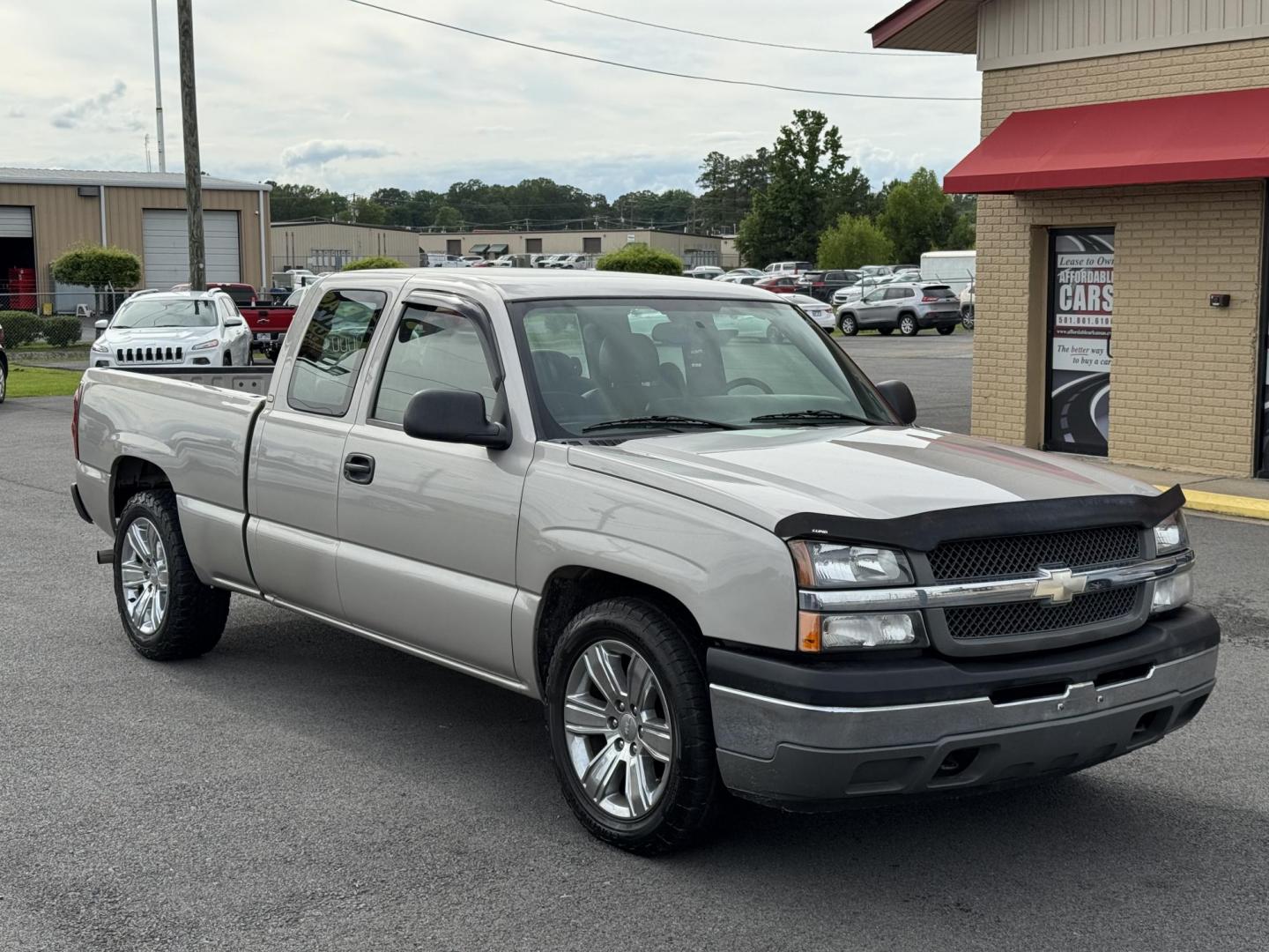 2005 Gold Chevrolet Silverado 1500 Extended Cab (1GCEC19X65Z) with an V6, 4.3 Liter engine, Automatic transmission, located at 8008 Warden Rd, Sherwood, AR, 72120, (501) 801-6100, 34.830078, -92.186684 - Photo#1