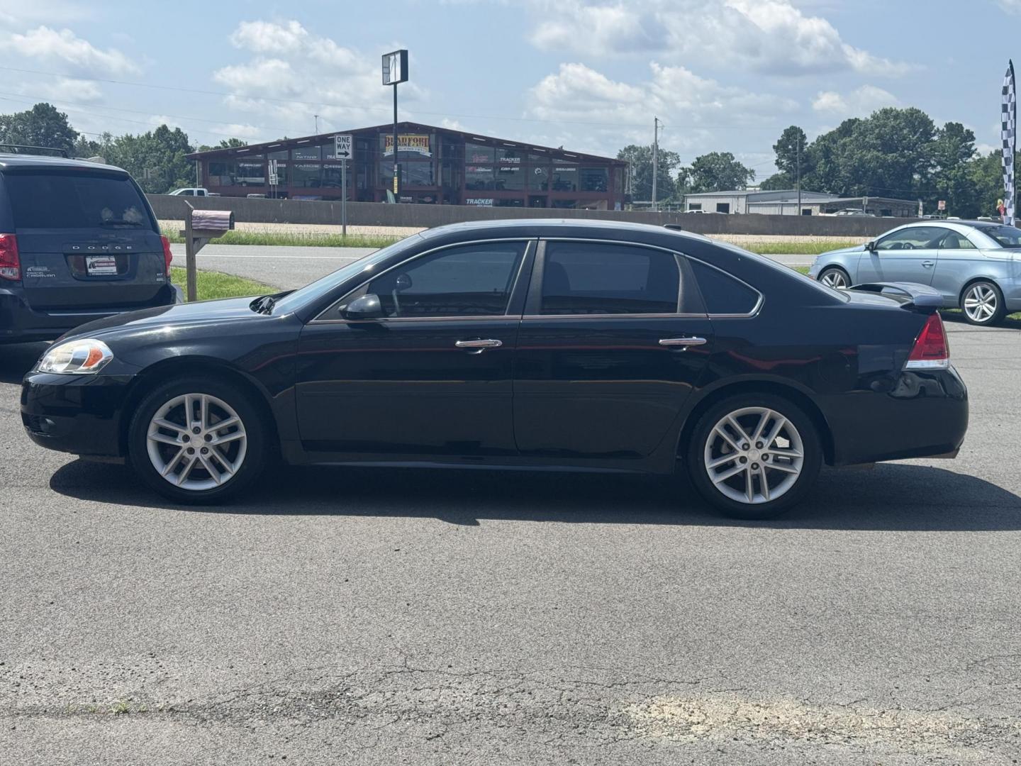 2013 Black Chevrolet Impala (2G1WC5E31D1) with an V6, 3.6 Liter engine, Auto, 6-Spd Overdrive transmission, located at 8008 Warden Rd, Sherwood, AR, 72120, (501) 801-6100, 34.830078, -92.186684 - Photo#4