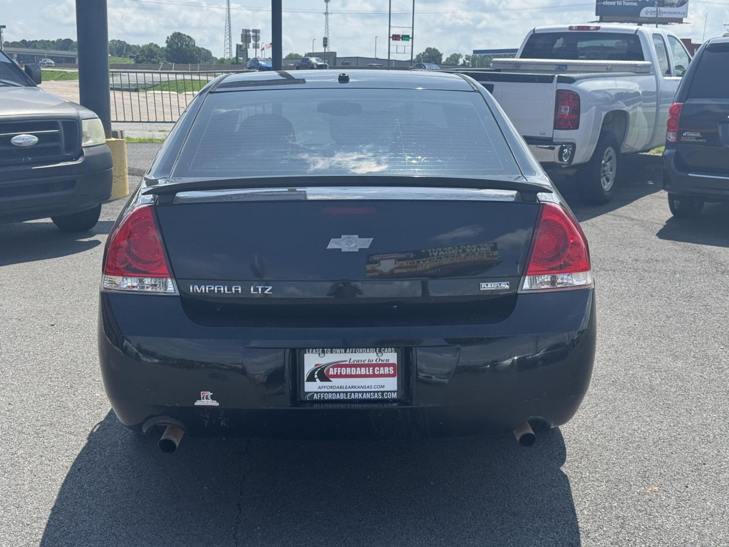 2013 Black Chevrolet Impala (2G1WC5E31D1) with an V6, 3.6 Liter engine, Auto, 6-Spd Overdrive transmission, located at 8008 Warden Rd, Sherwood, AR, 72120, (501) 801-6100, 34.830078, -92.186684 - Photo#6