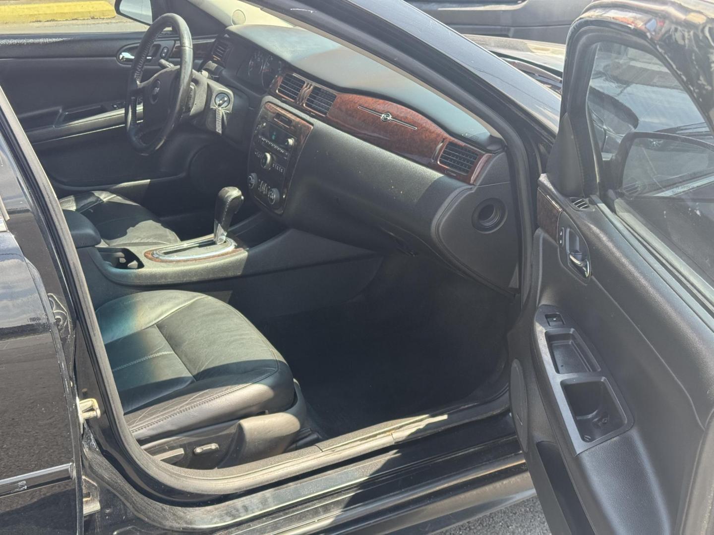 2013 Black Chevrolet Impala (2G1WC5E31D1) with an V6, 3.6 Liter engine, Auto, 6-Spd Overdrive transmission, located at 8008 Warden Rd, Sherwood, AR, 72120, (501) 801-6100, 34.830078, -92.186684 - Photo#8