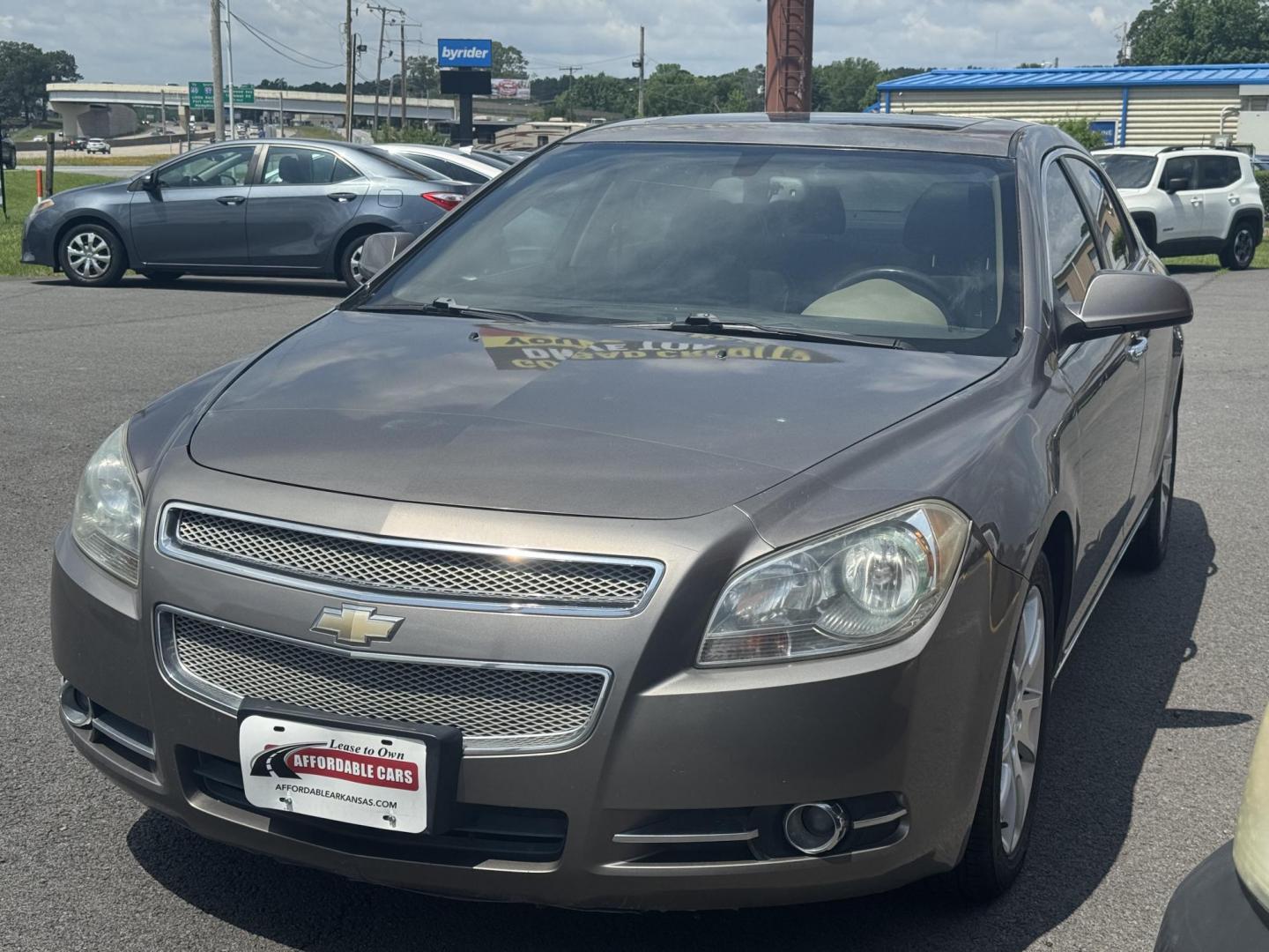 2010 Beige Chevrolet Malibu (1G1ZE5E7XAF) with an V6, 3.6 Liter engine, Auto, 6-Spd Overdrive and TAPshft transmission, located at 8008 Warden Rd, Sherwood, AR, 72120, (501) 801-6100, 34.830078, -92.186684 - Photo#3