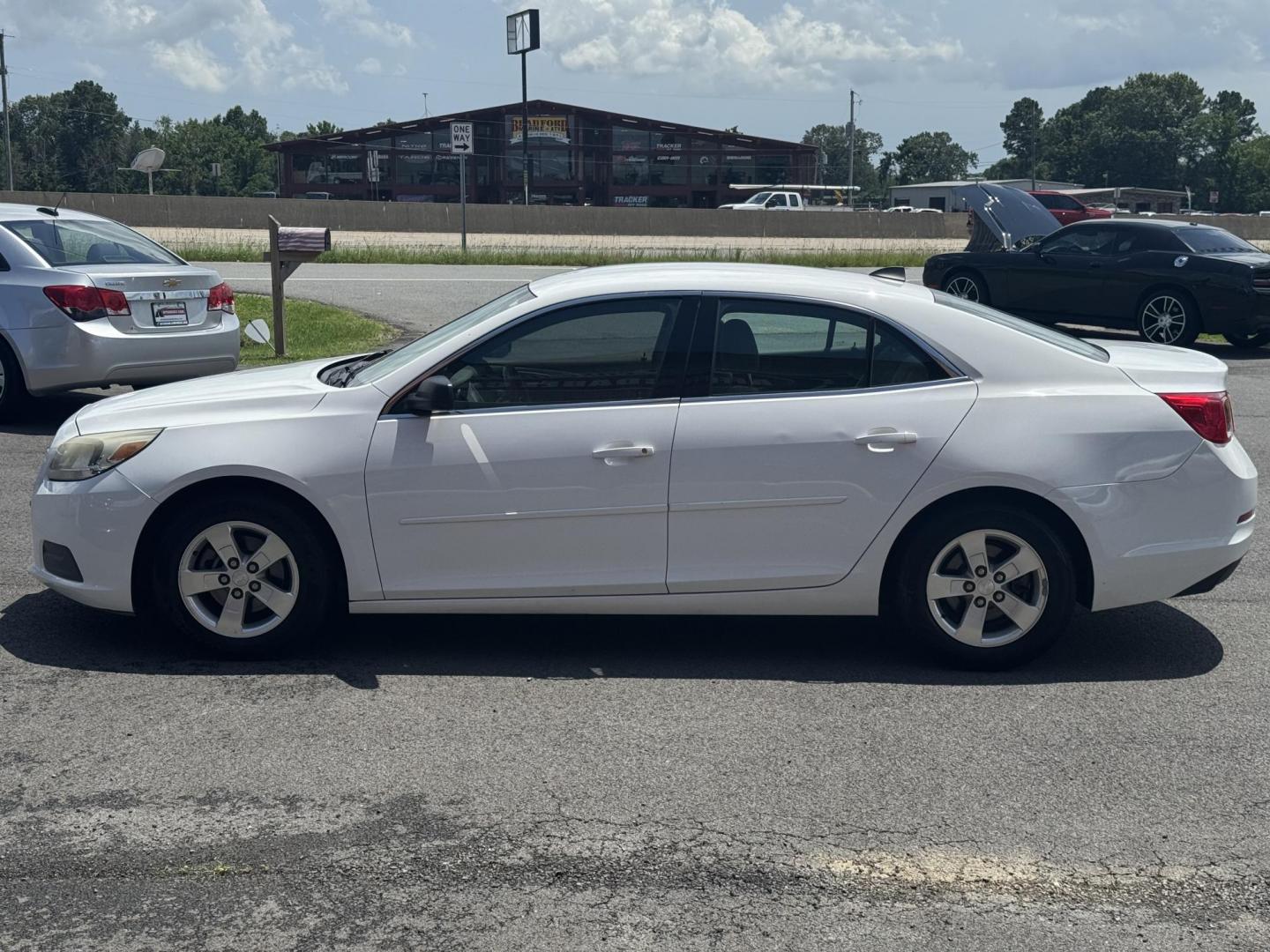 2013 White Chevrolet Malibu (1G11B5SA3DF) with an 4-Cyl, 2.5 Liter engine, Auto, 6-Spd w/OD and Man Md transmission, located at 8008 Warden Rd, Sherwood, AR, 72120, (501) 801-6100, 34.830078, -92.186684 - Photo#4