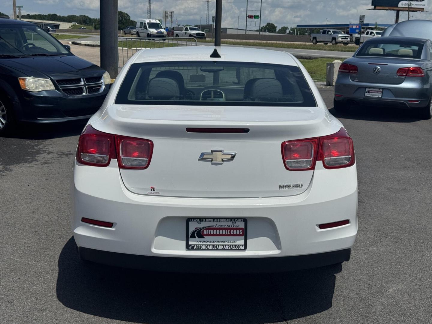 2013 White Chevrolet Malibu (1G11B5SA3DF) with an 4-Cyl, 2.5 Liter engine, Auto, 6-Spd w/OD and Man Md transmission, located at 8008 Warden Rd, Sherwood, AR, 72120, (501) 801-6100, 34.830078, -92.186684 - Photo#6