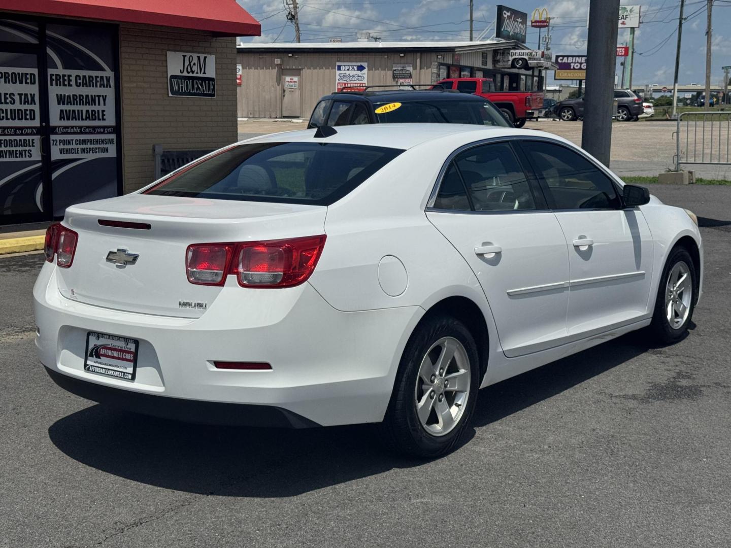 2013 White Chevrolet Malibu (1G11B5SA3DF) with an 4-Cyl, 2.5 Liter engine, Auto, 6-Spd w/OD and Man Md transmission, located at 8008 Warden Rd, Sherwood, AR, 72120, (501) 801-6100, 34.830078, -92.186684 - Photo#7