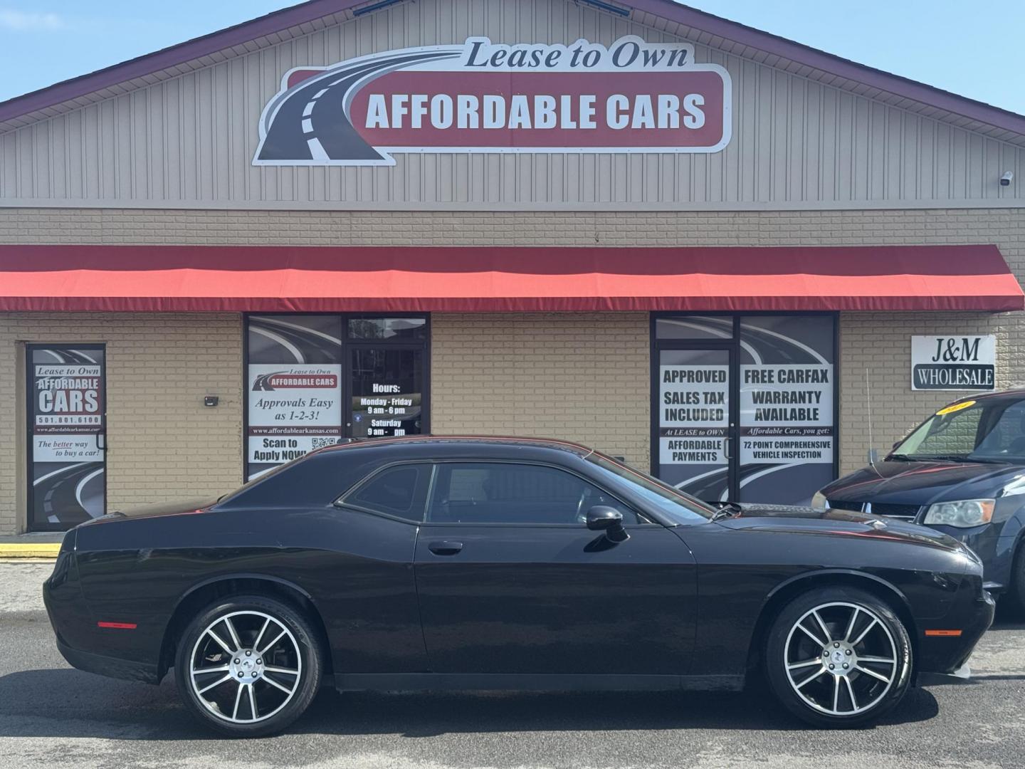 2015 Black Dodge Challenger (2C3CDZAG8FH) with an V6, 3.6 Liter engine, Automatic, 8-Spd transmission, located at 8008 Warden Rd, Sherwood, AR, 72120, (501) 801-6100, 34.830078, -92.186684 - Photo#0