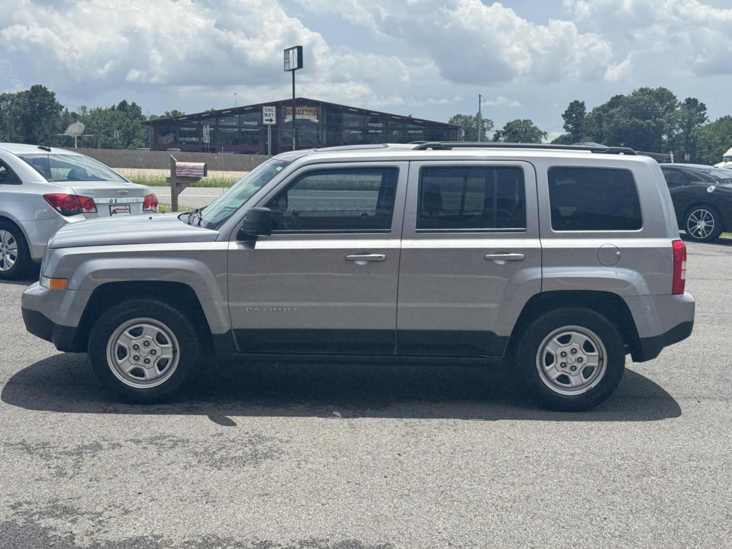 2014 Gray Jeep Patriot (1C4NJPBA8ED) with an 4-Cyl, 2.0 Liter engine, Automatic, 6-Spd w/AutoStick transmission, located at 8008 Warden Rd, Sherwood, AR, 72120, (501) 801-6100, 34.830078, -92.186684 - Photo#3
