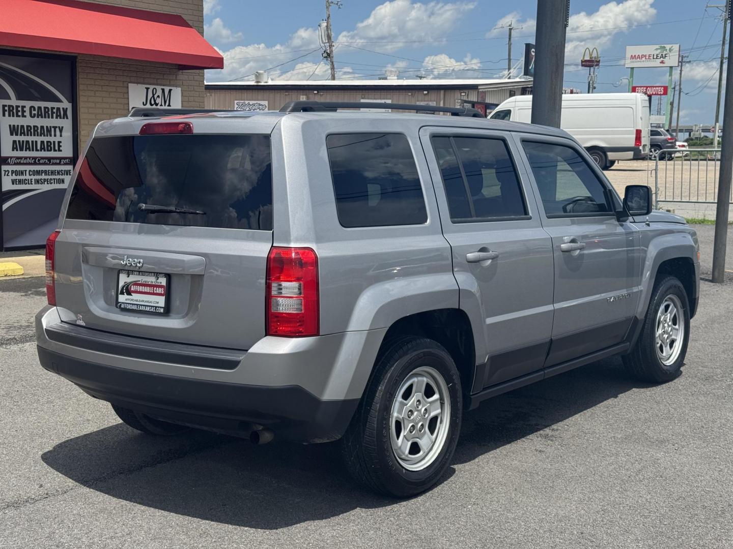 2014 Gray Jeep Patriot (1C4NJPBA8ED) with an 4-Cyl, 2.0 Liter engine, Automatic, 6-Spd w/AutoStick transmission, located at 8008 Warden Rd, Sherwood, AR, 72120, (501) 801-6100, 34.830078, -92.186684 - Photo#6