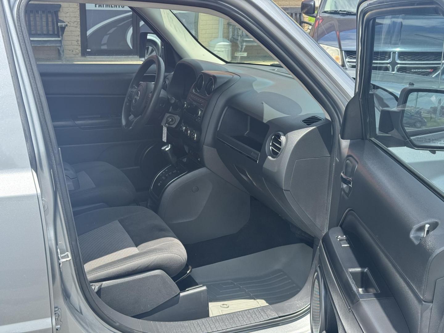 2014 Gray Jeep Patriot (1C4NJPBA8ED) with an 4-Cyl, 2.0 Liter engine, Automatic, 6-Spd w/AutoStick transmission, located at 8008 Warden Rd, Sherwood, AR, 72120, (501) 801-6100, 34.830078, -92.186684 - Photo#7
