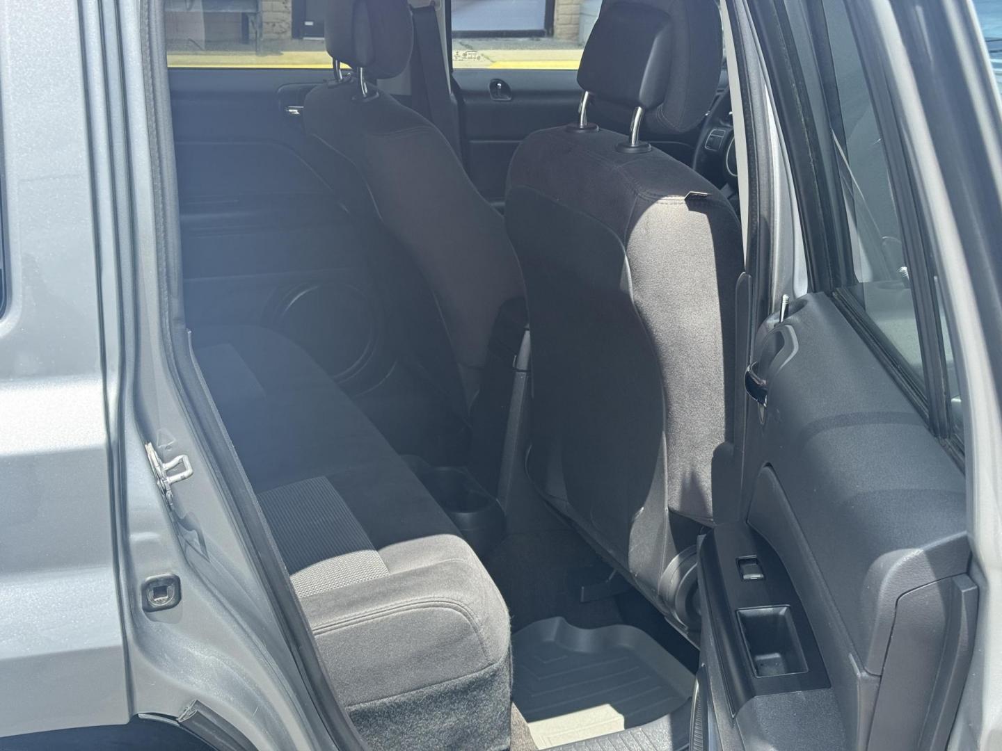 2014 Gray Jeep Patriot (1C4NJPBA8ED) with an 4-Cyl, 2.0 Liter engine, Automatic, 6-Spd w/AutoStick transmission, located at 8008 Warden Rd, Sherwood, AR, 72120, (501) 801-6100, 34.830078, -92.186684 - Photo#8