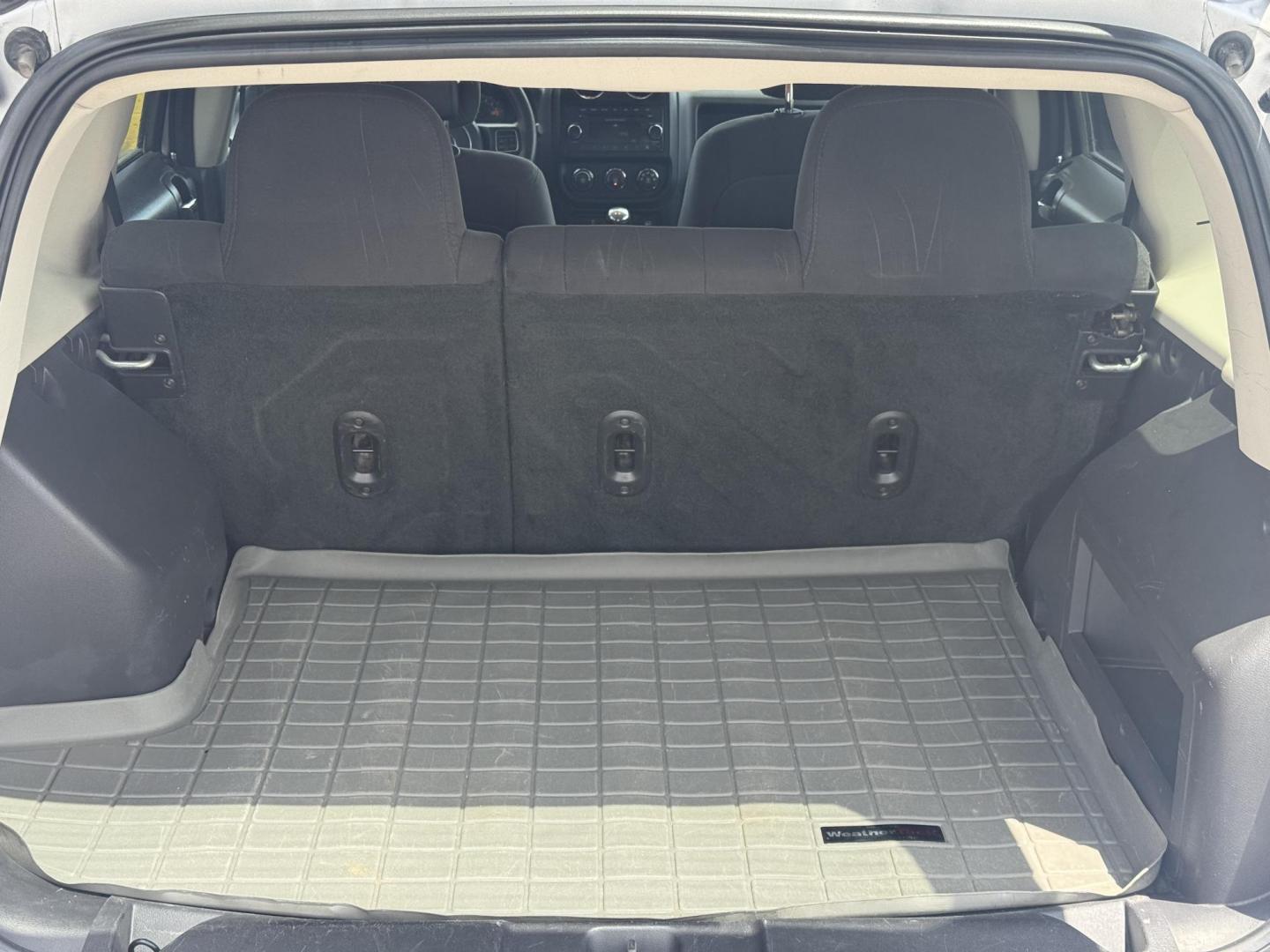 2014 Gray Jeep Patriot (1C4NJPBA8ED) with an 4-Cyl, 2.0 Liter engine, Automatic, 6-Spd w/AutoStick transmission, located at 8008 Warden Rd, Sherwood, AR, 72120, (501) 801-6100, 34.830078, -92.186684 - Photo#9