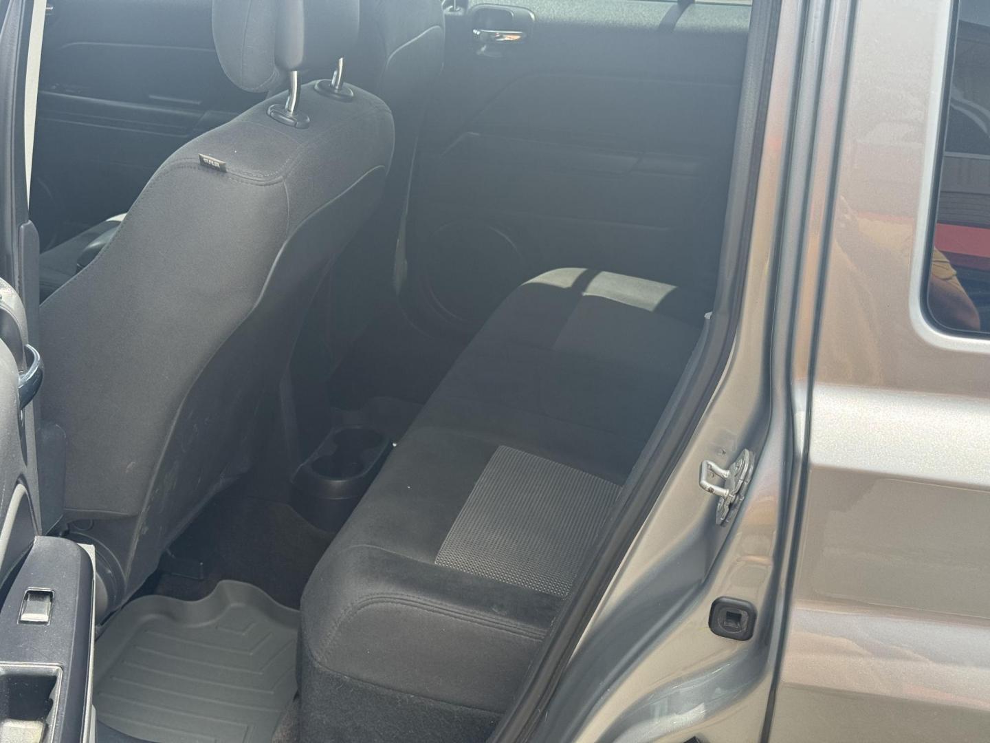 2014 Gray Jeep Patriot (1C4NJPBA8ED) with an 4-Cyl, 2.0 Liter engine, Automatic, 6-Spd w/AutoStick transmission, located at 8008 Warden Rd, Sherwood, AR, 72120, (501) 801-6100, 34.830078, -92.186684 - Photo#10