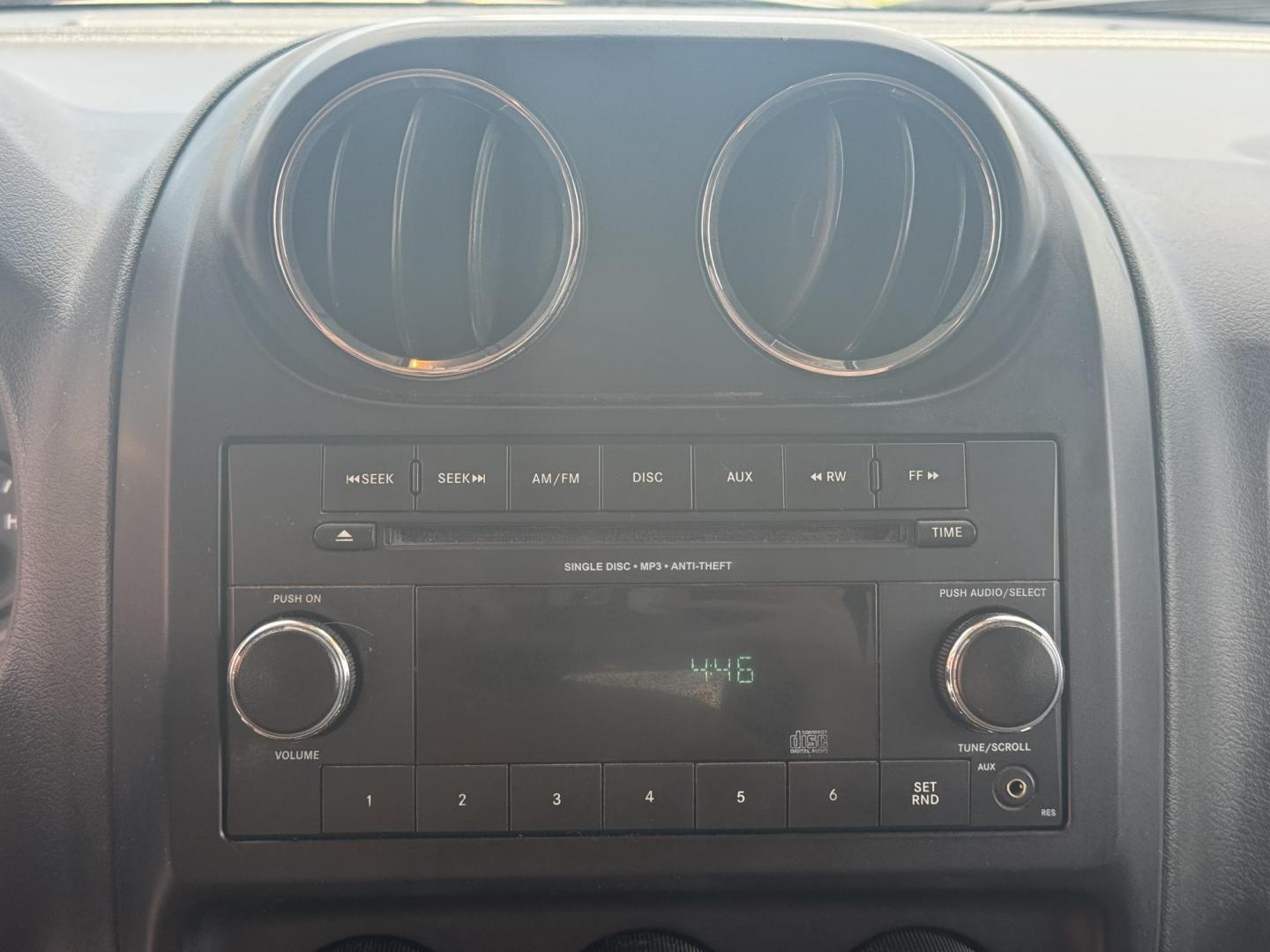 2014 Gray Jeep Patriot (1C4NJPBA8ED) with an 4-Cyl, 2.0 Liter engine, Automatic, 6-Spd w/AutoStick transmission, located at 8008 Warden Rd, Sherwood, AR, 72120, (501) 801-6100, 34.830078, -92.186684 - Photo#12